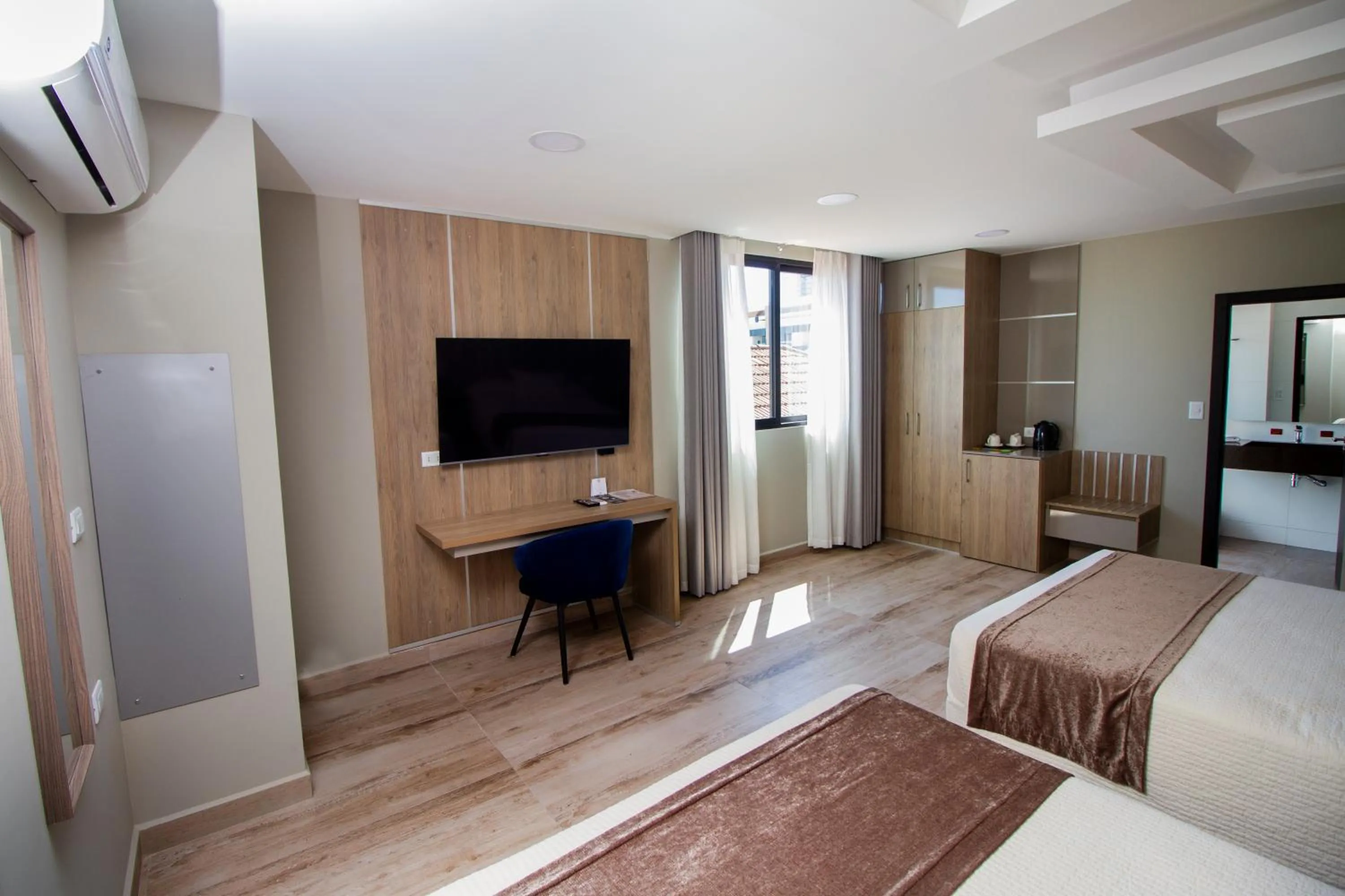 Photo of the whole room, Bed in Hotel Sirari By Regina