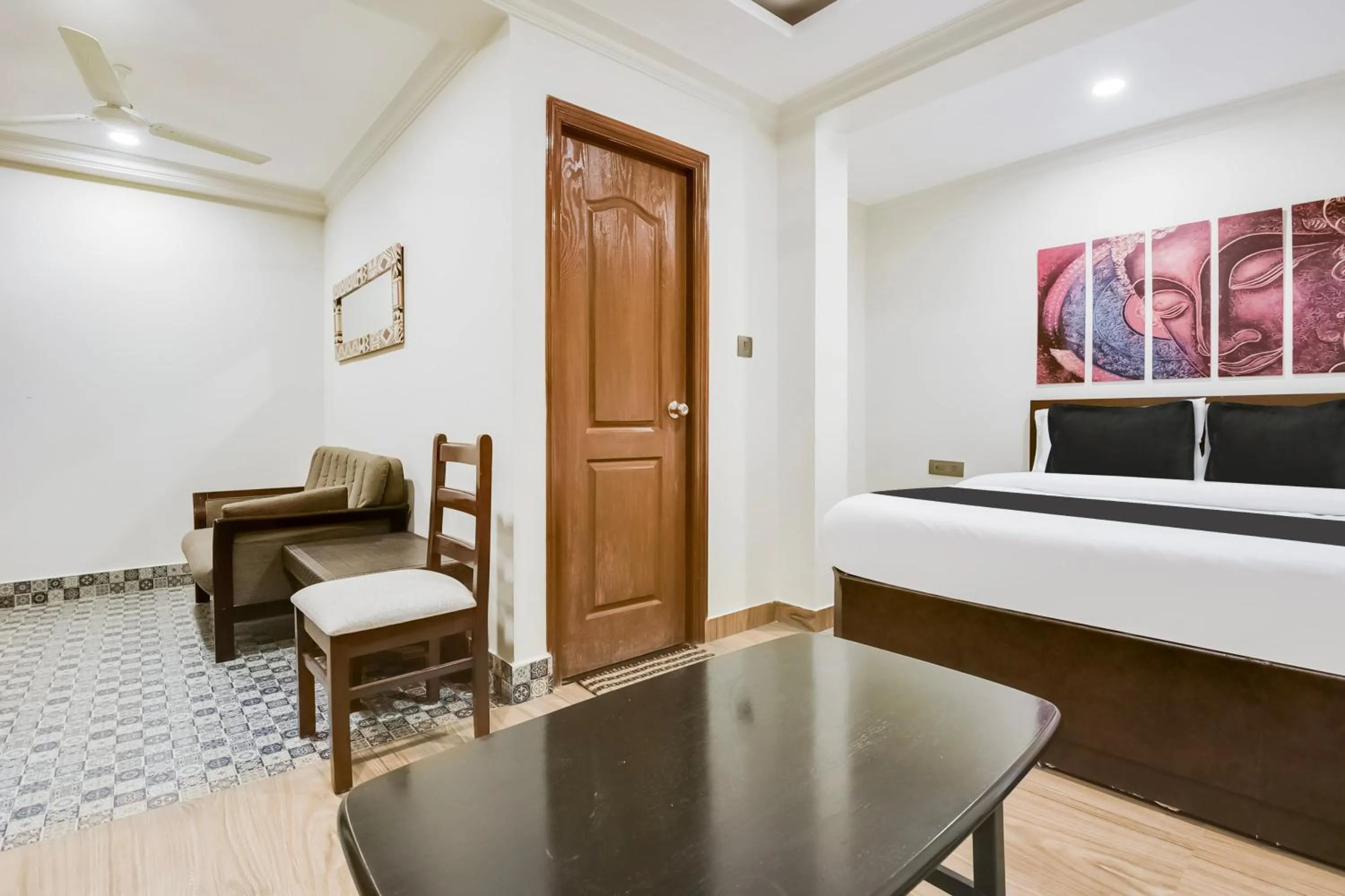 Bedroom in Super Hotel O Dabolim Near Goa International Airport