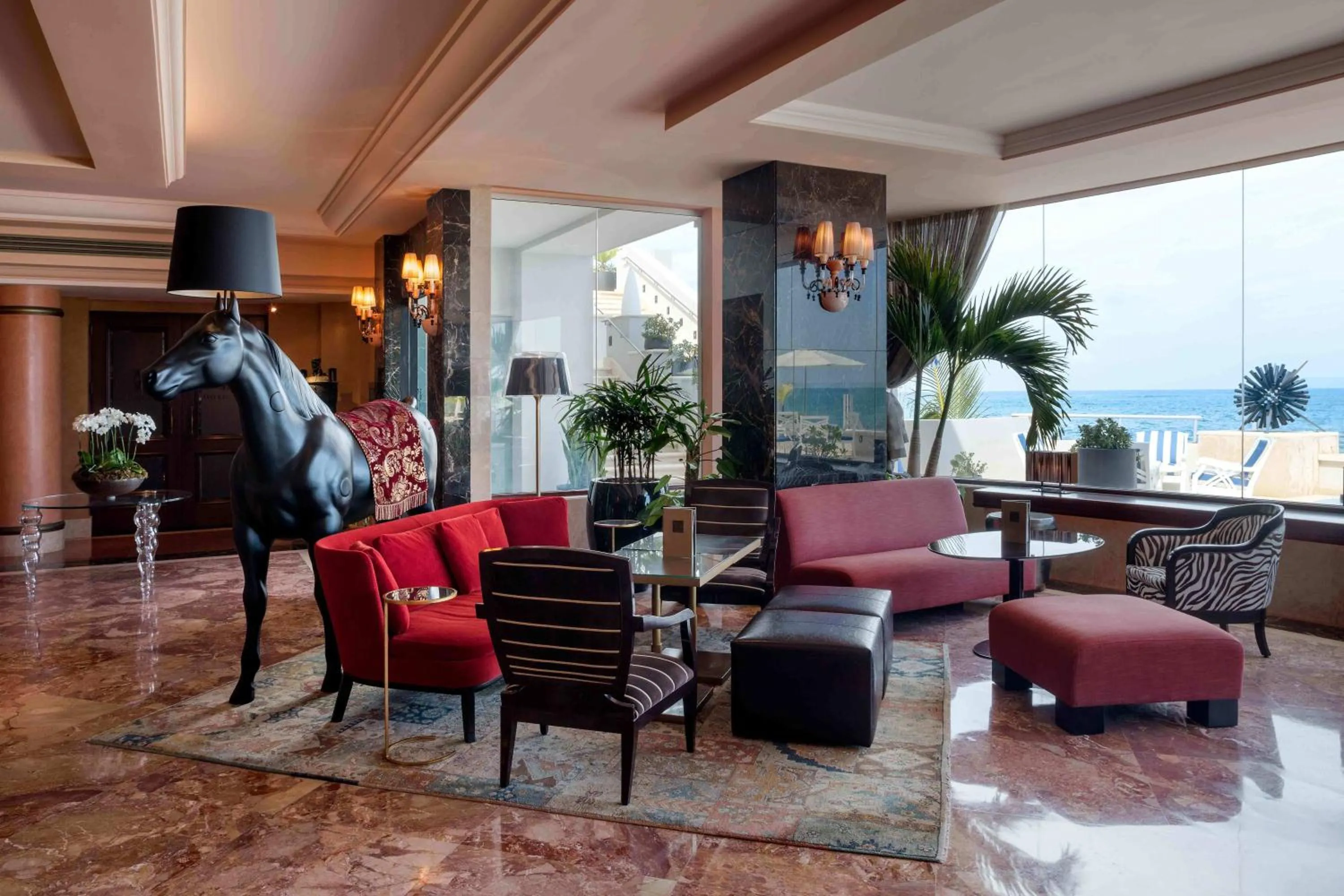 Communal lounge/ TV room in Condado Vanderbilt Hotel