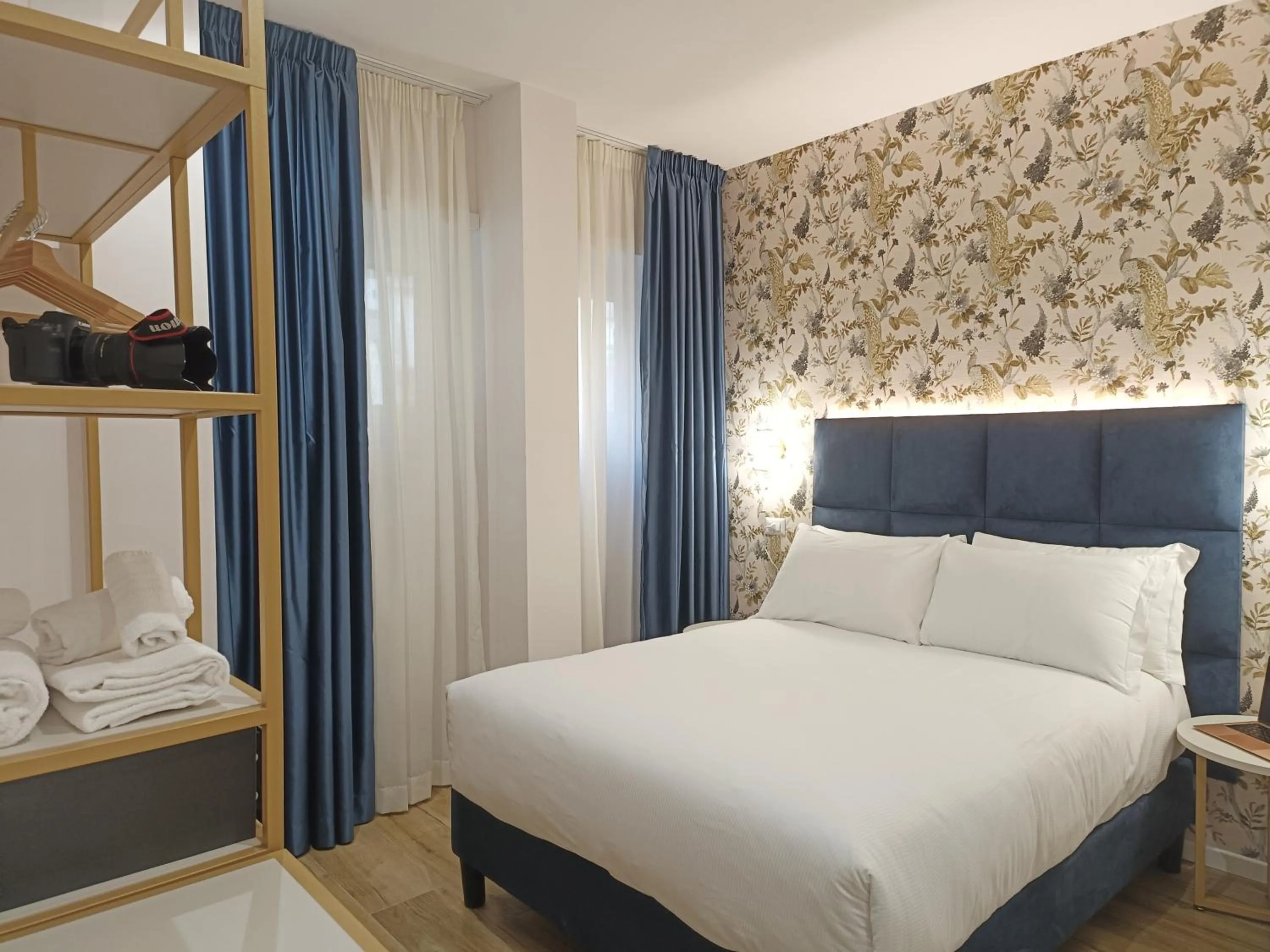 Photo of the whole room, Bed in Romi Suite