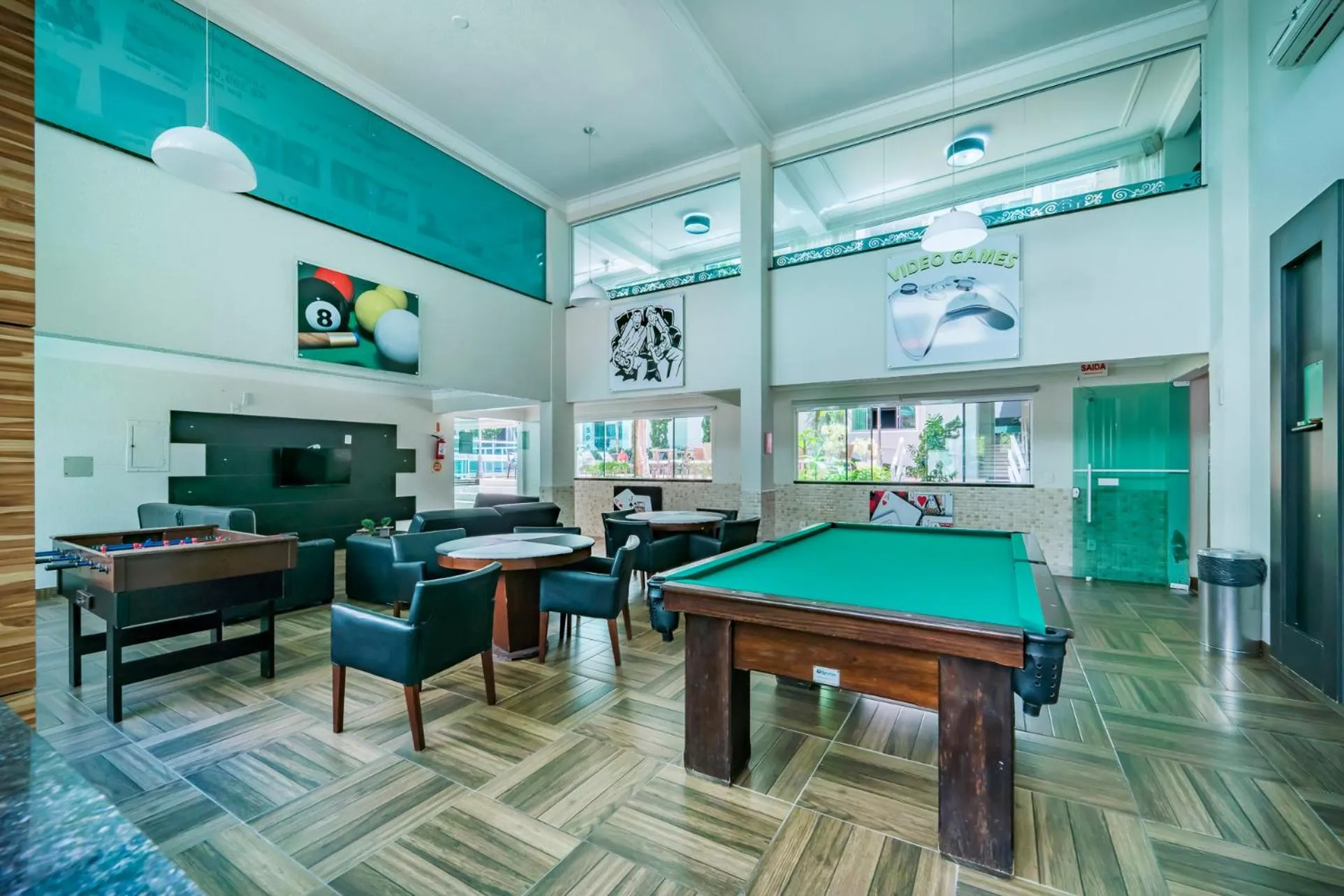 Communal lounge/ TV room in Bombinhas Summer Beach APT 333