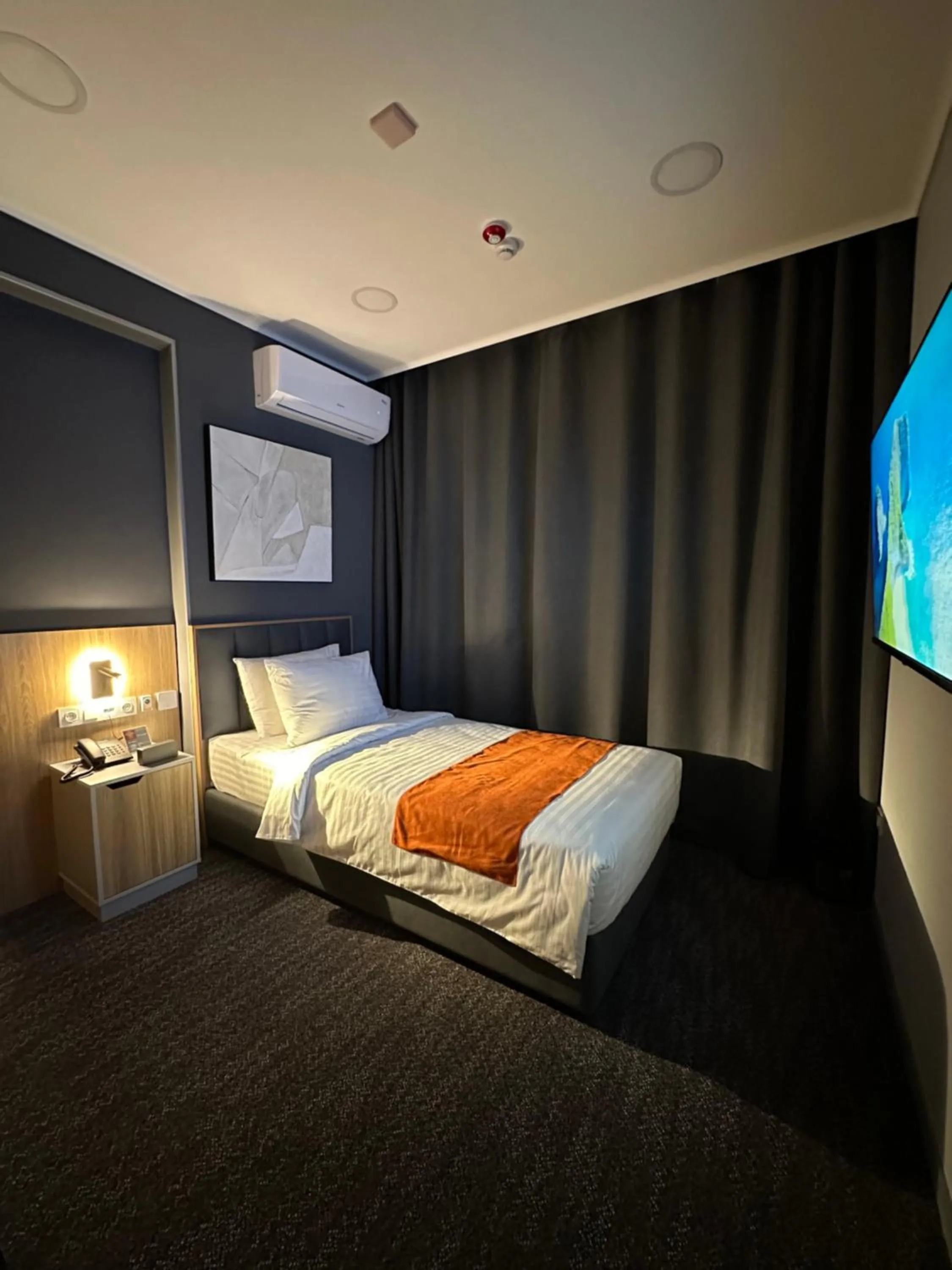 Bed in Nuovo Boutique Hotel