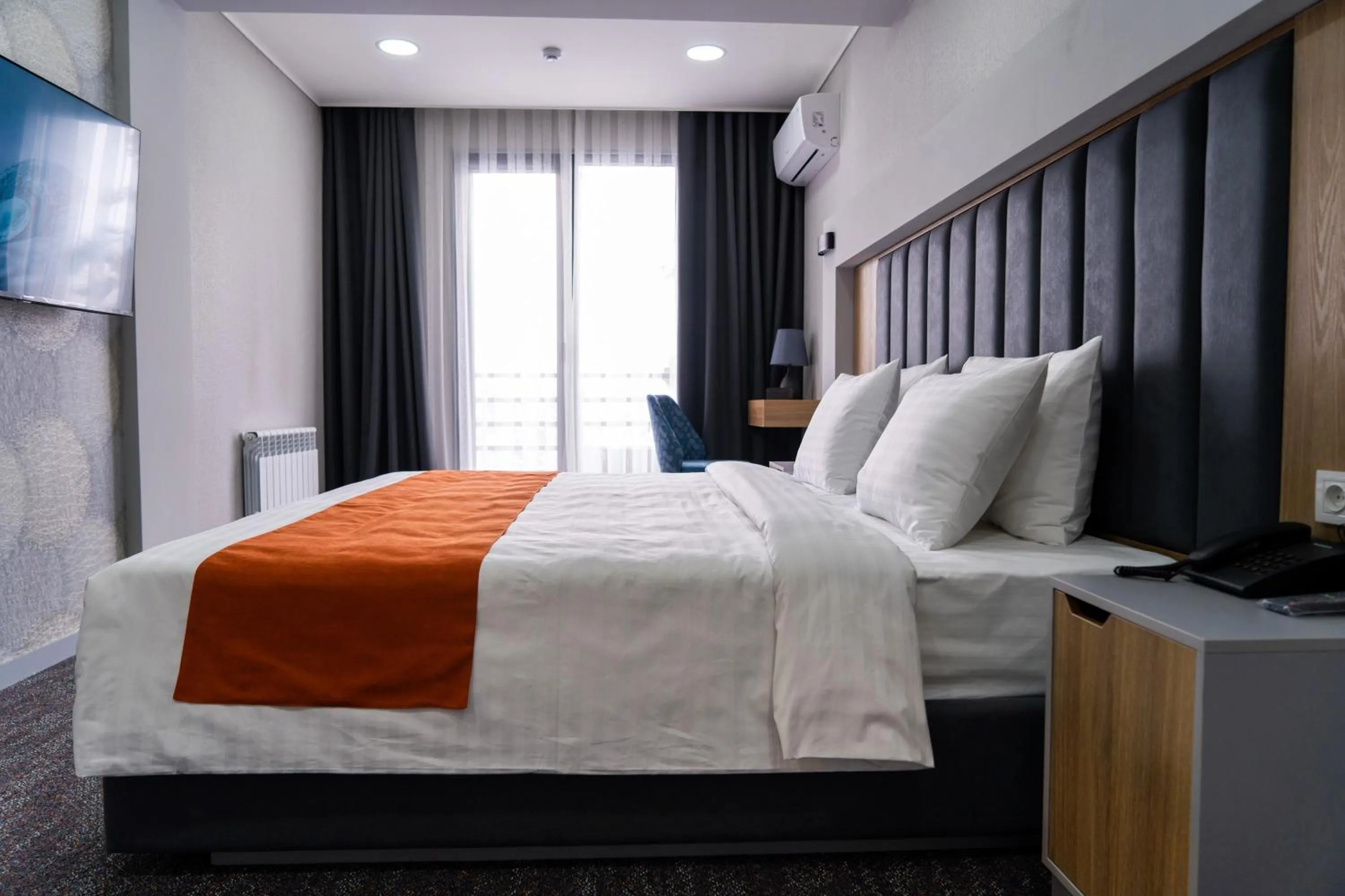 Bed in Nuovo Boutique Hotel