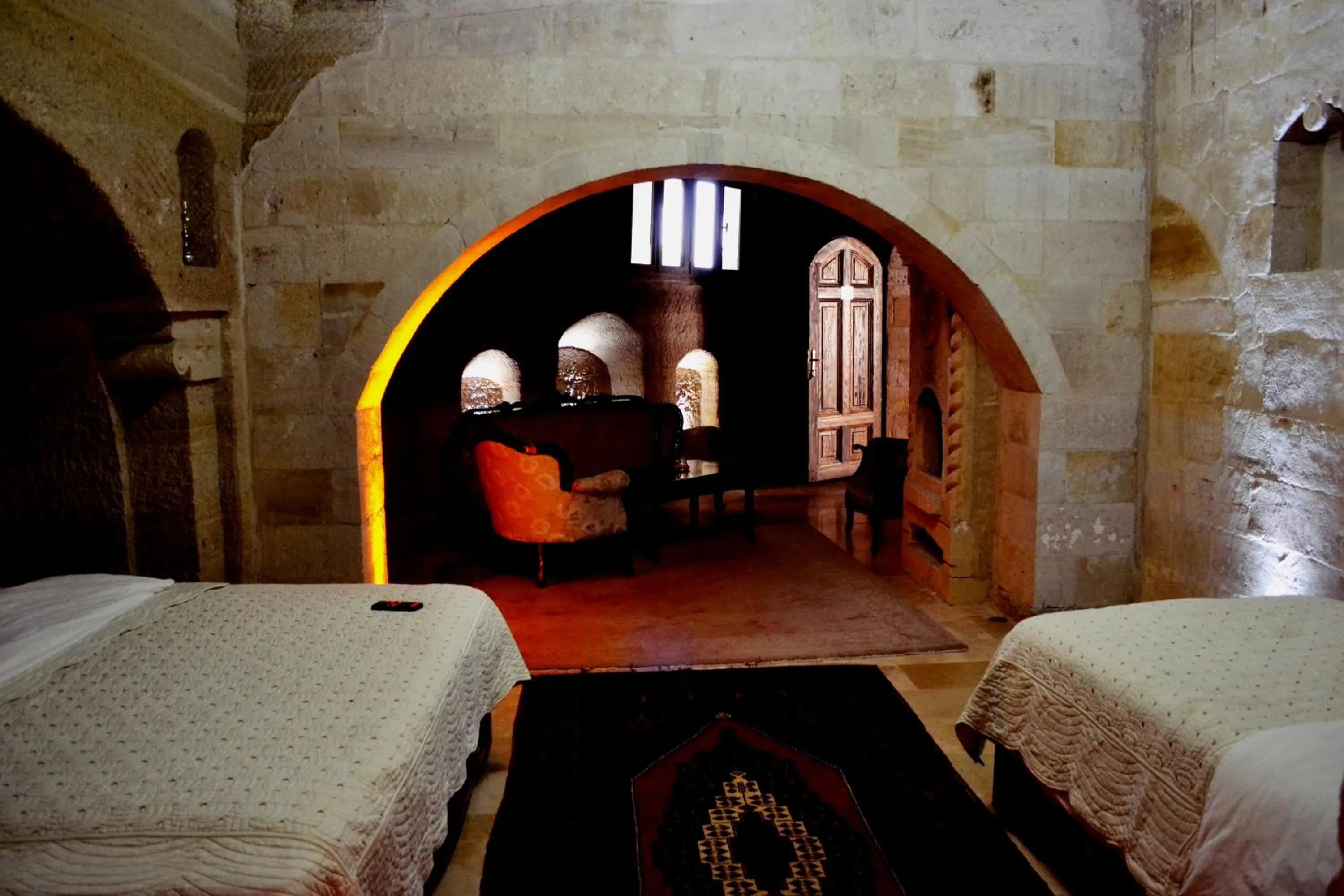 Bed in Family Cave Suite Hotel