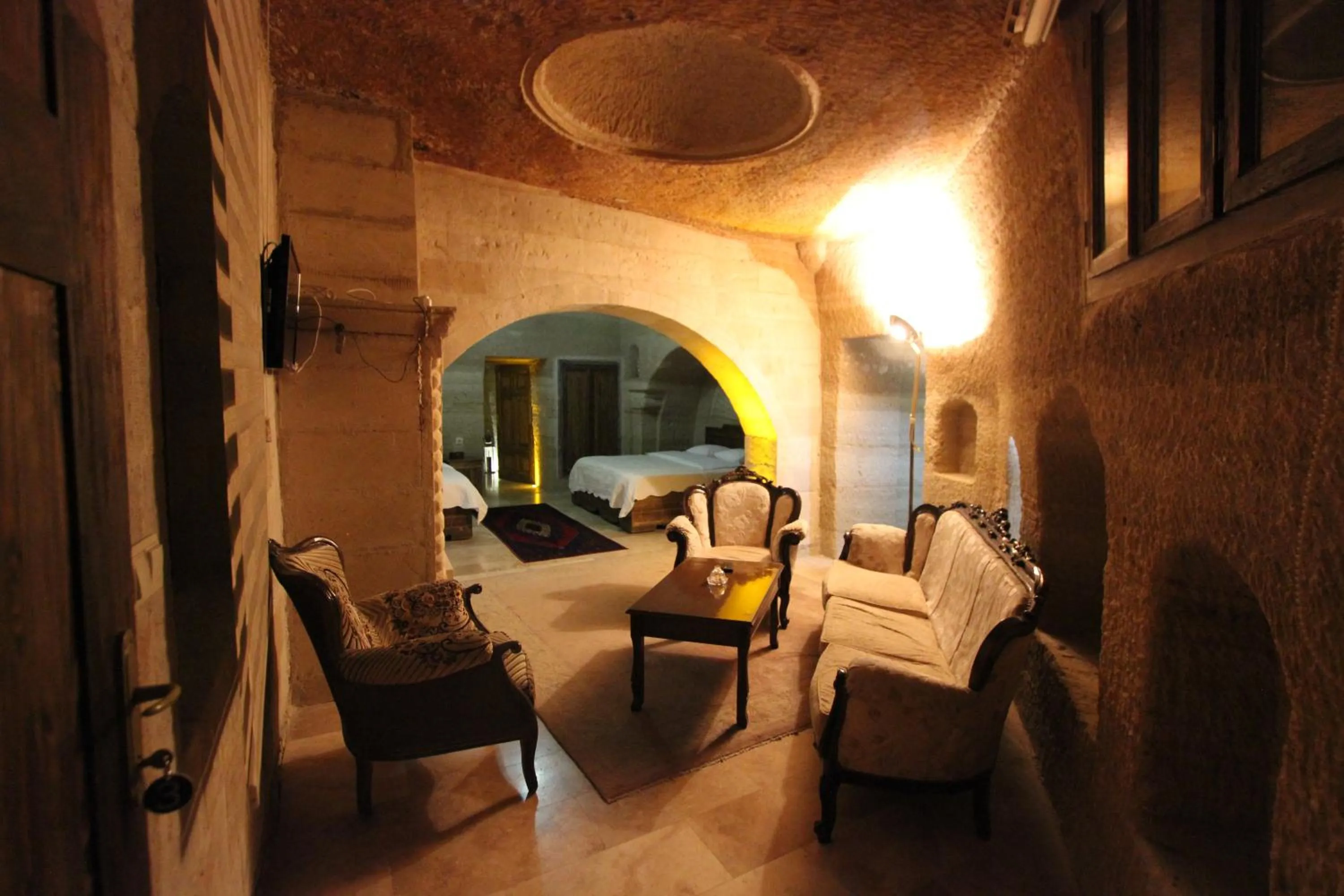 Seating area in Family Cave Suite Hotel