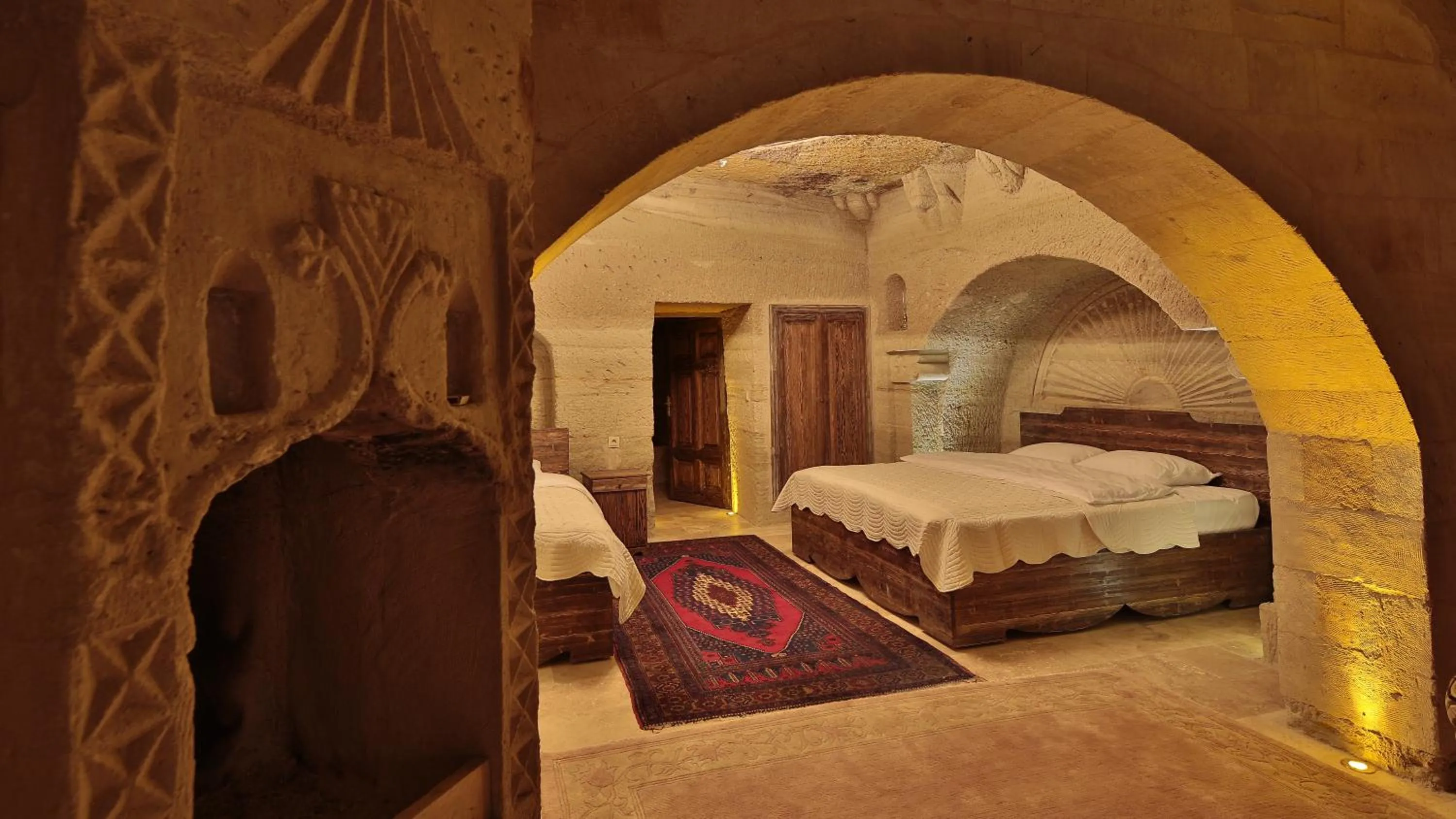 Bedroom, Bed in Family Cave Suite Hotel