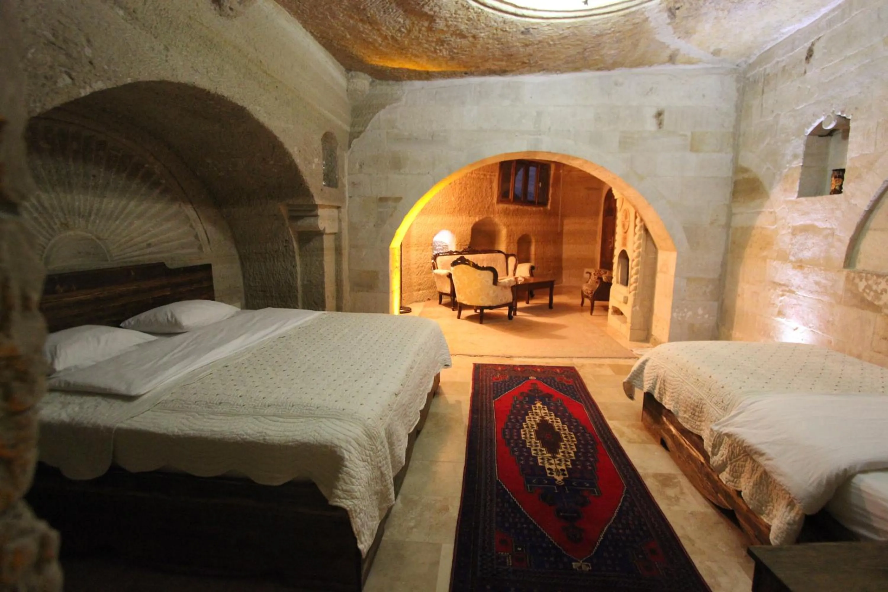 Photo of the whole room, Bed in Family Cave Suite Hotel