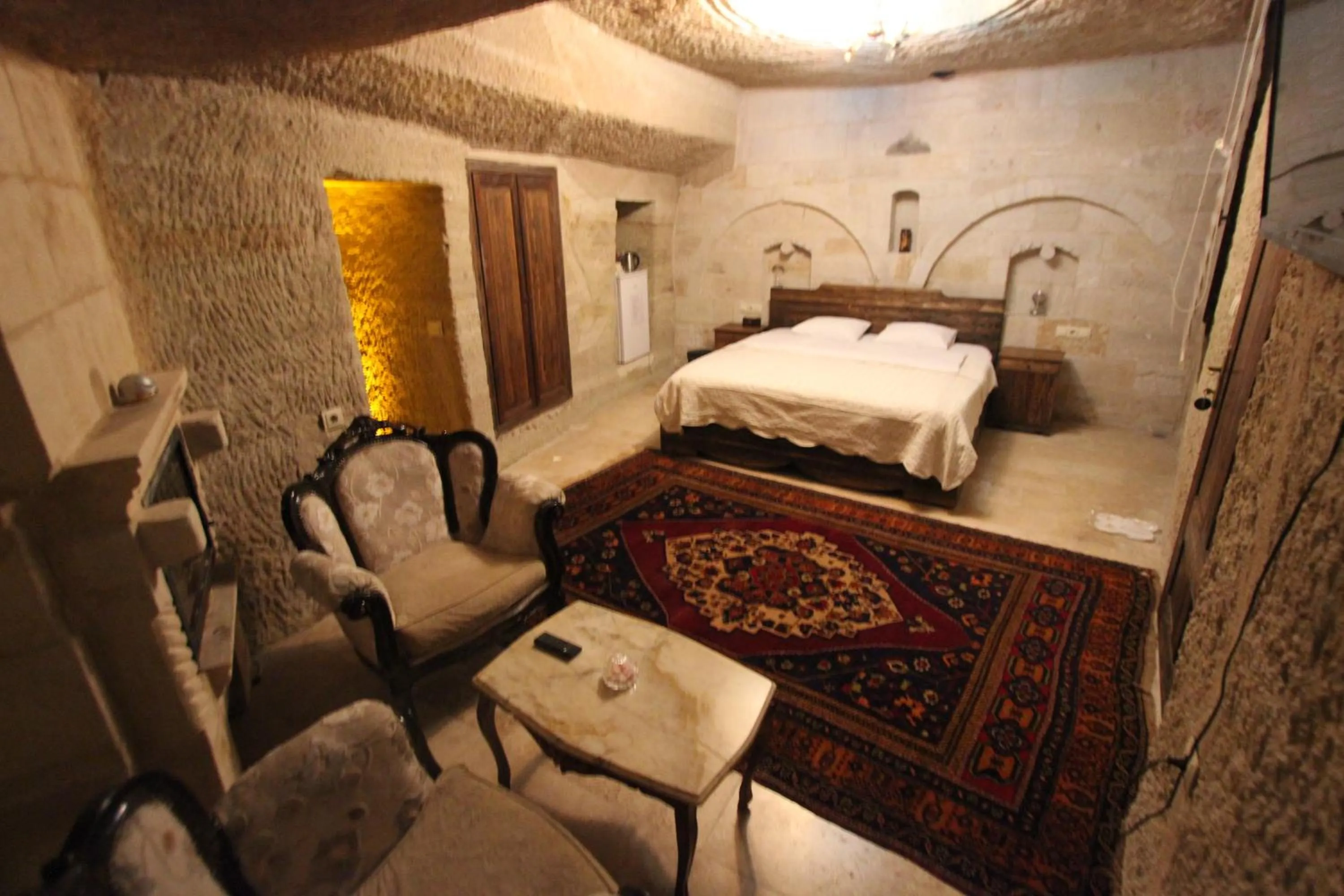 Photo of the whole room, Bed in Family Cave Suite Hotel