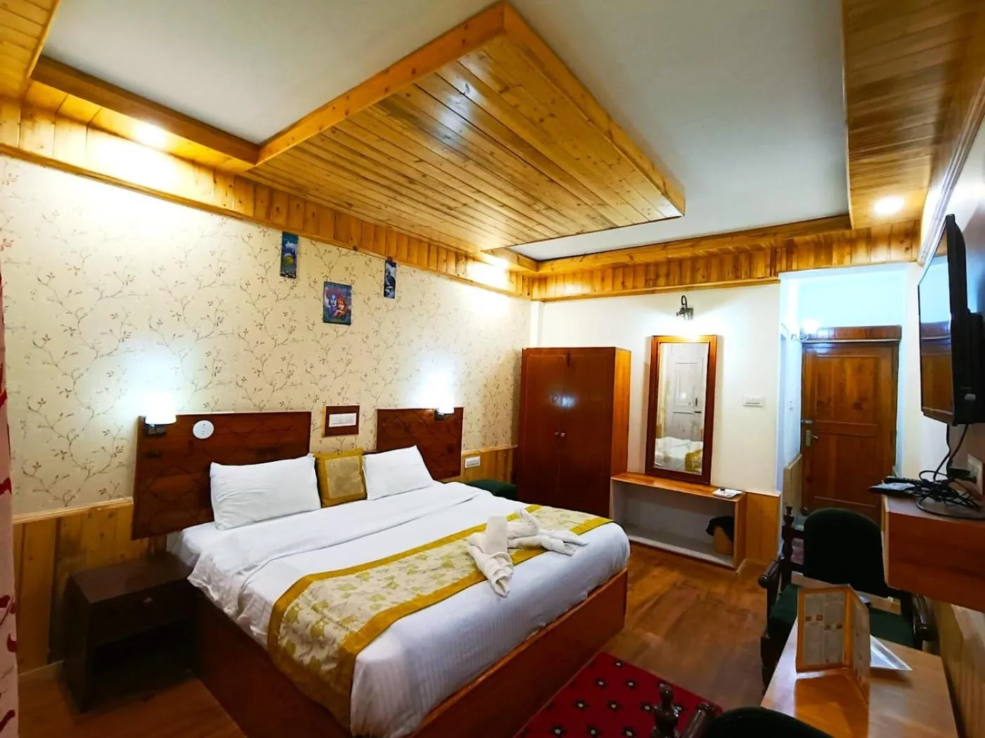 Bed in CS Shhandella Hotel