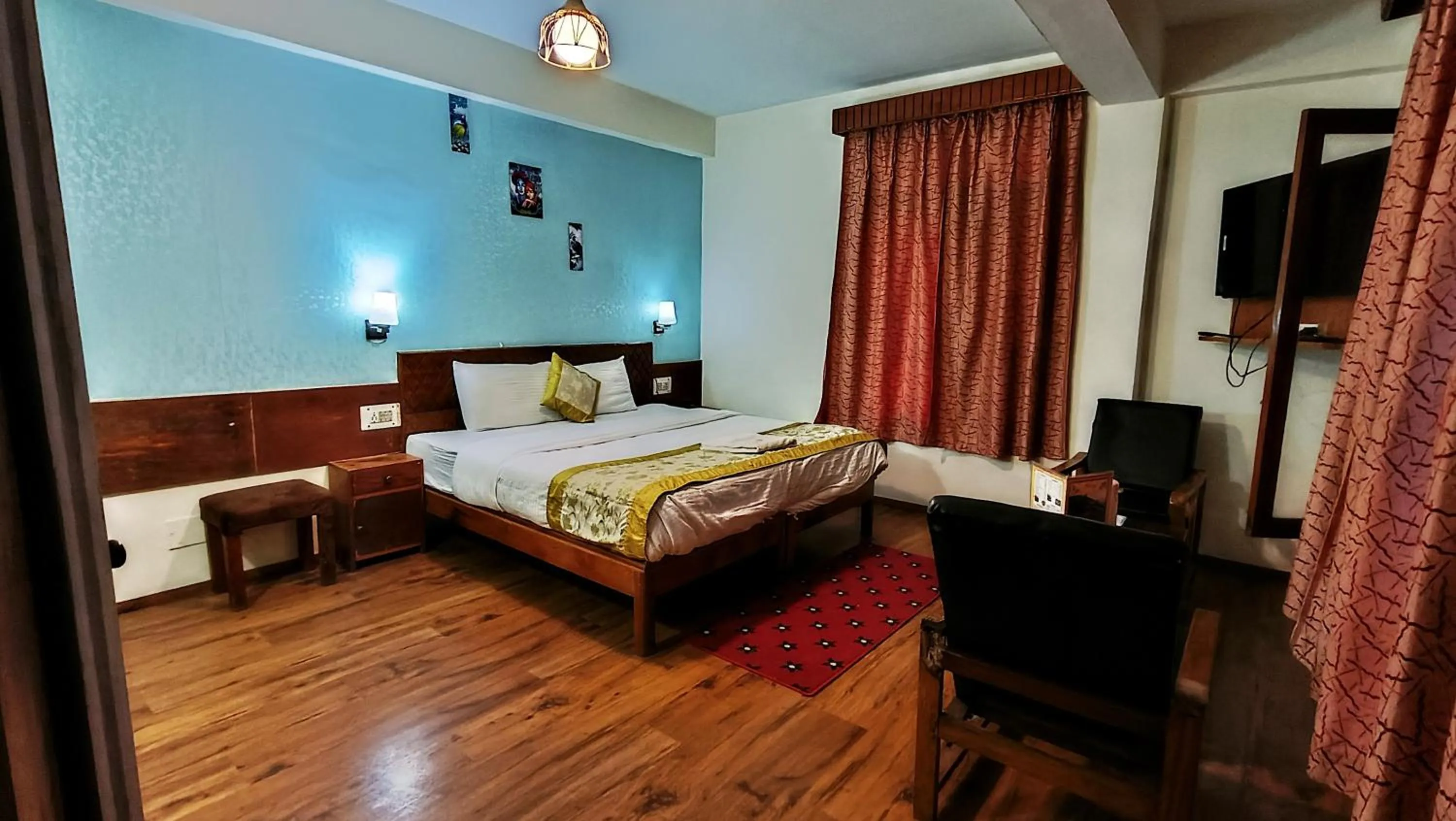 Bed in CS Shhandella Hotel