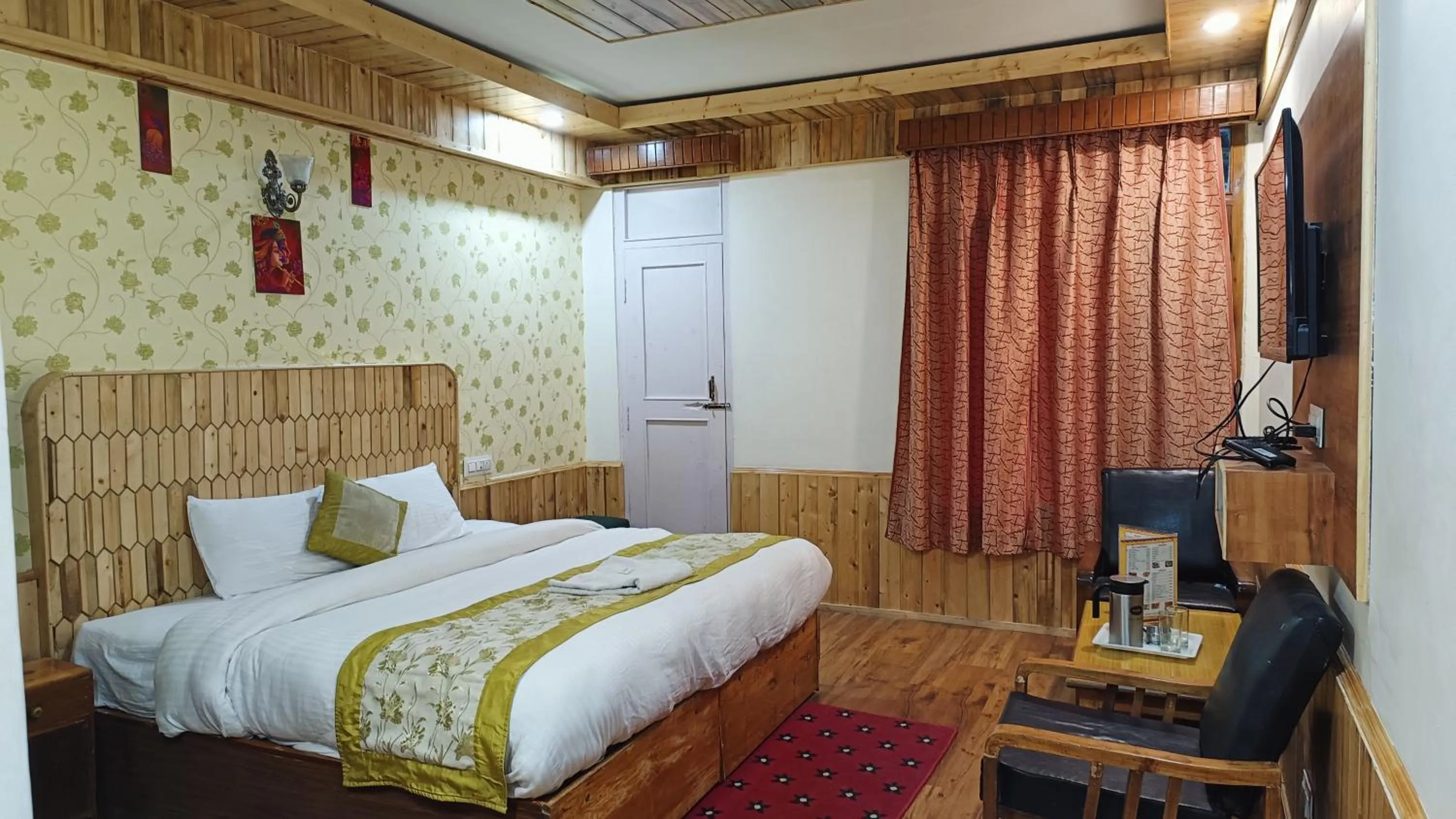 Bed in CS Shhandella Hotel