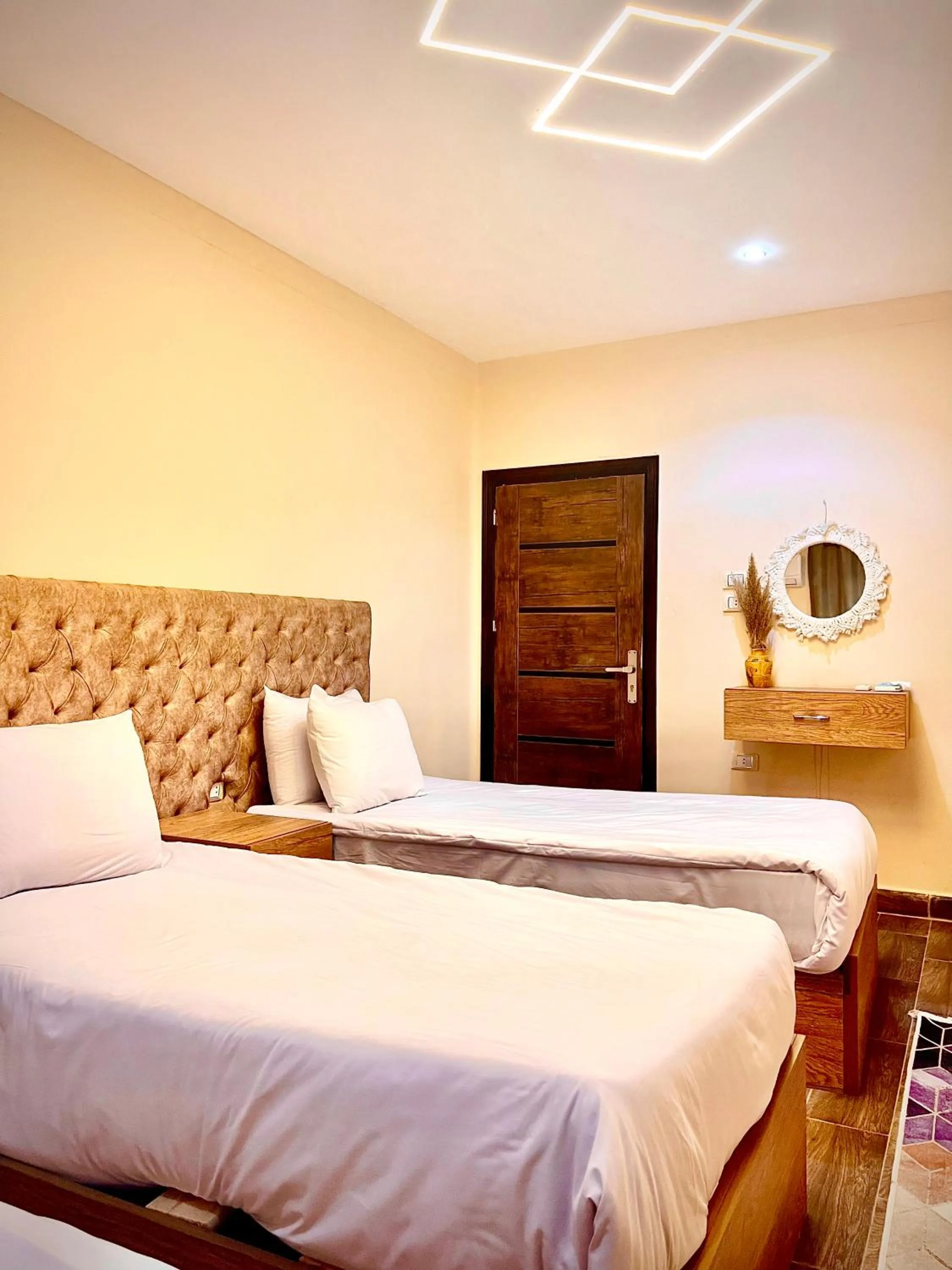 Bed in Farsha Pyramids Inn