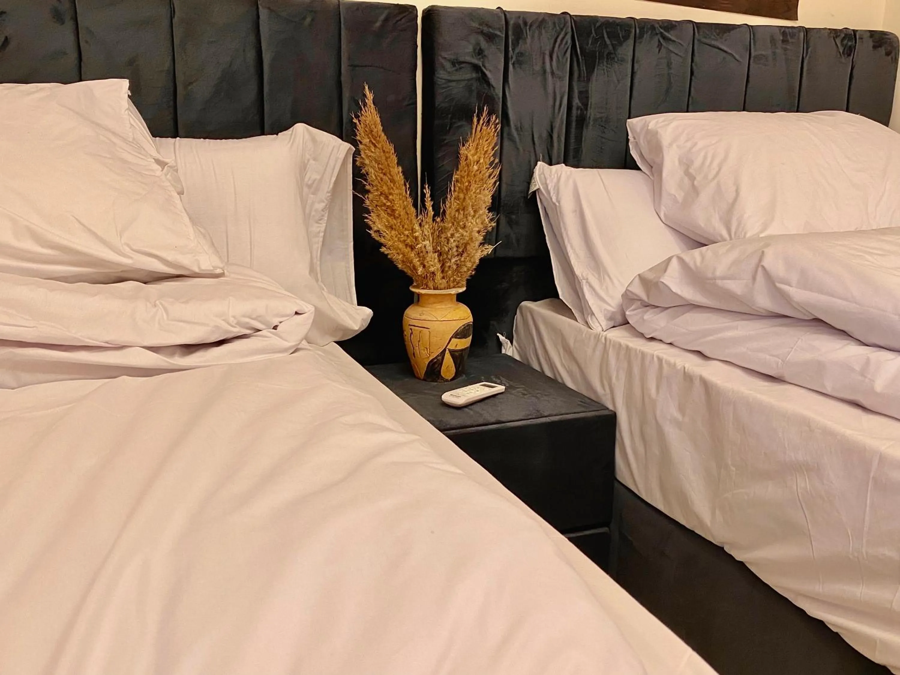 Bed in Farsha Pyramids Inn