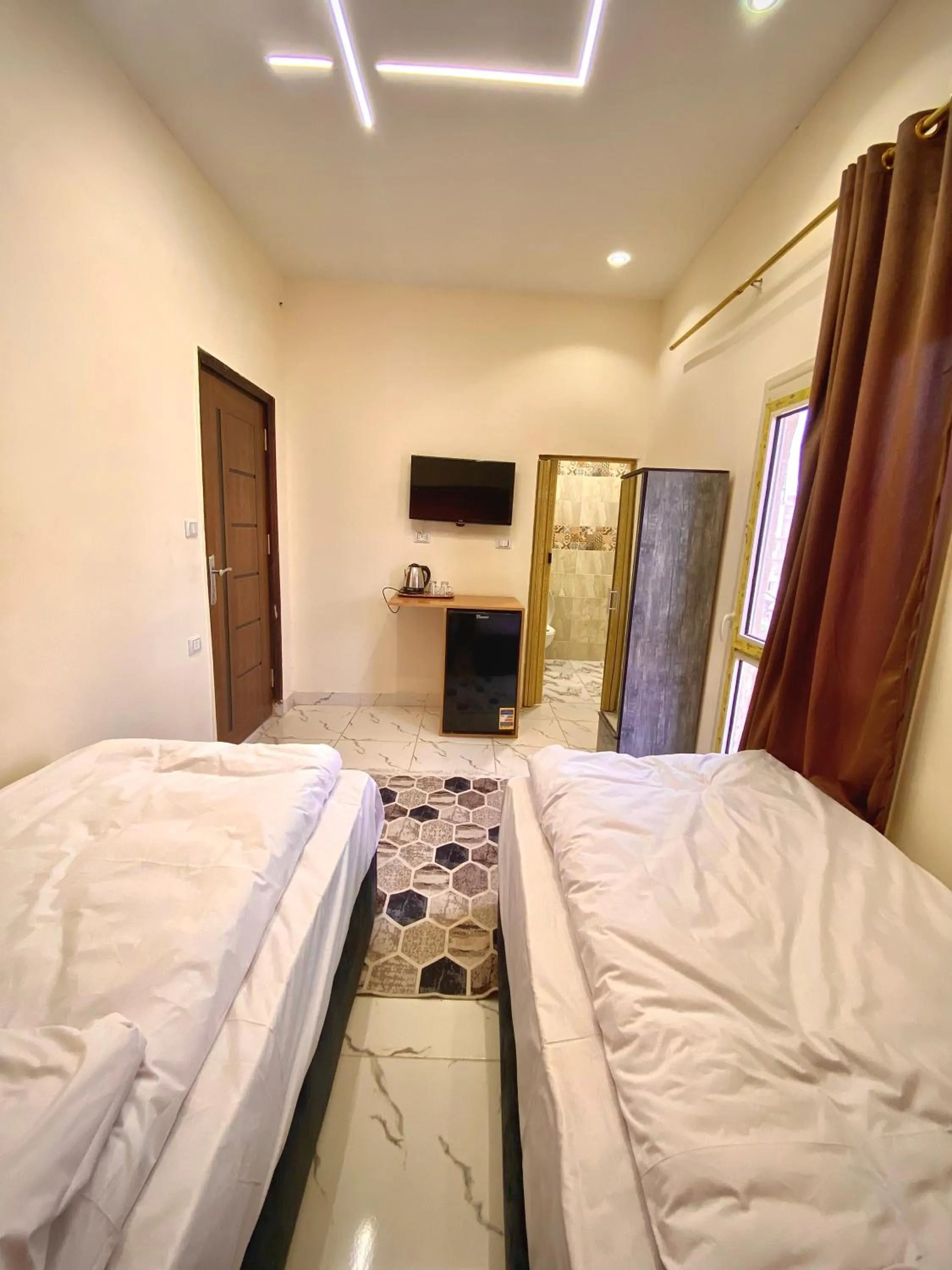 Bed in Farsha Pyramids Inn