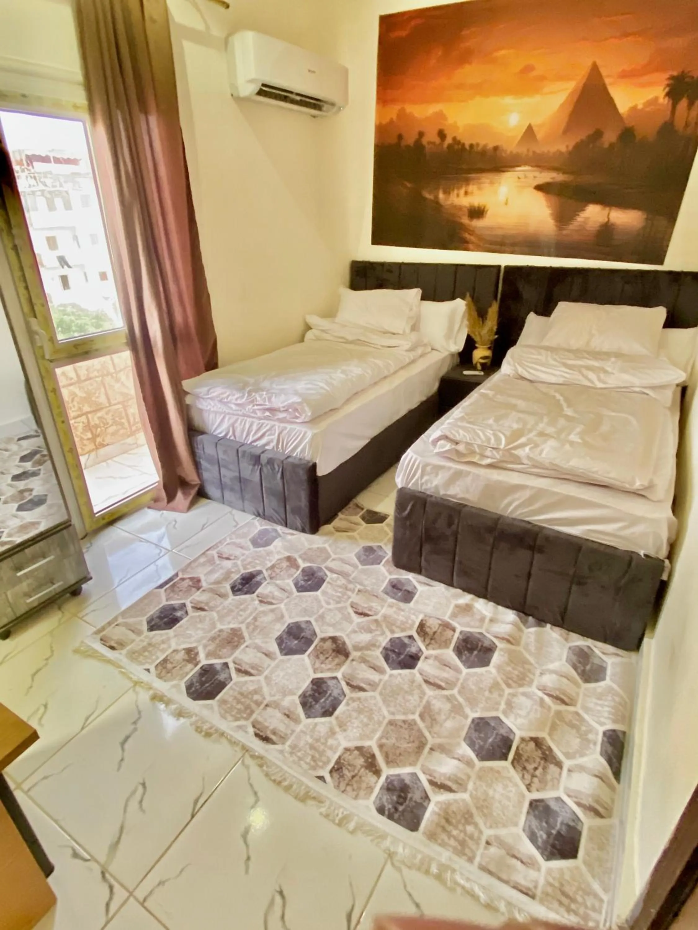 Bed in Farsha Pyramids Inn