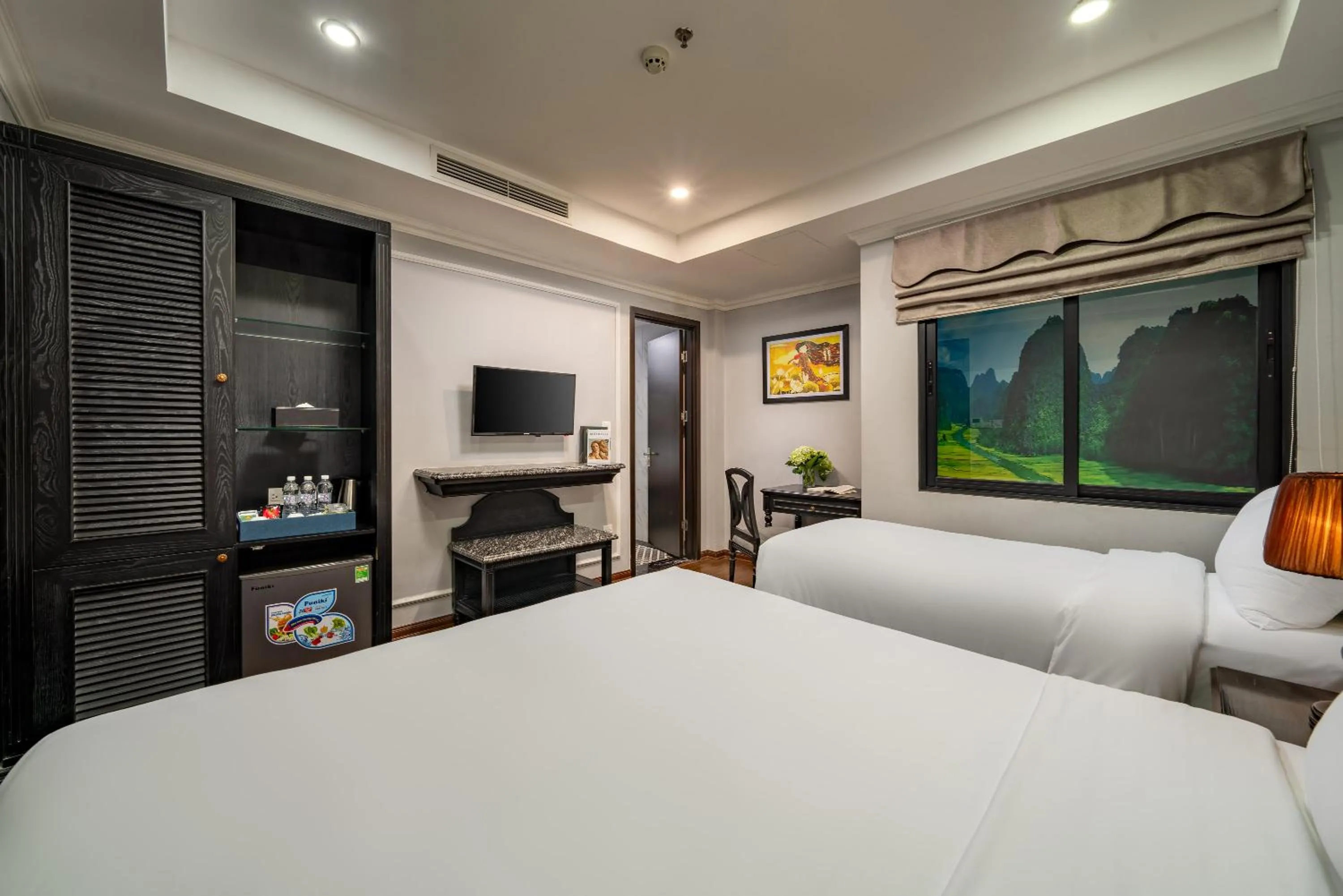 Bed in Amara Hanoi Hotel and Spa