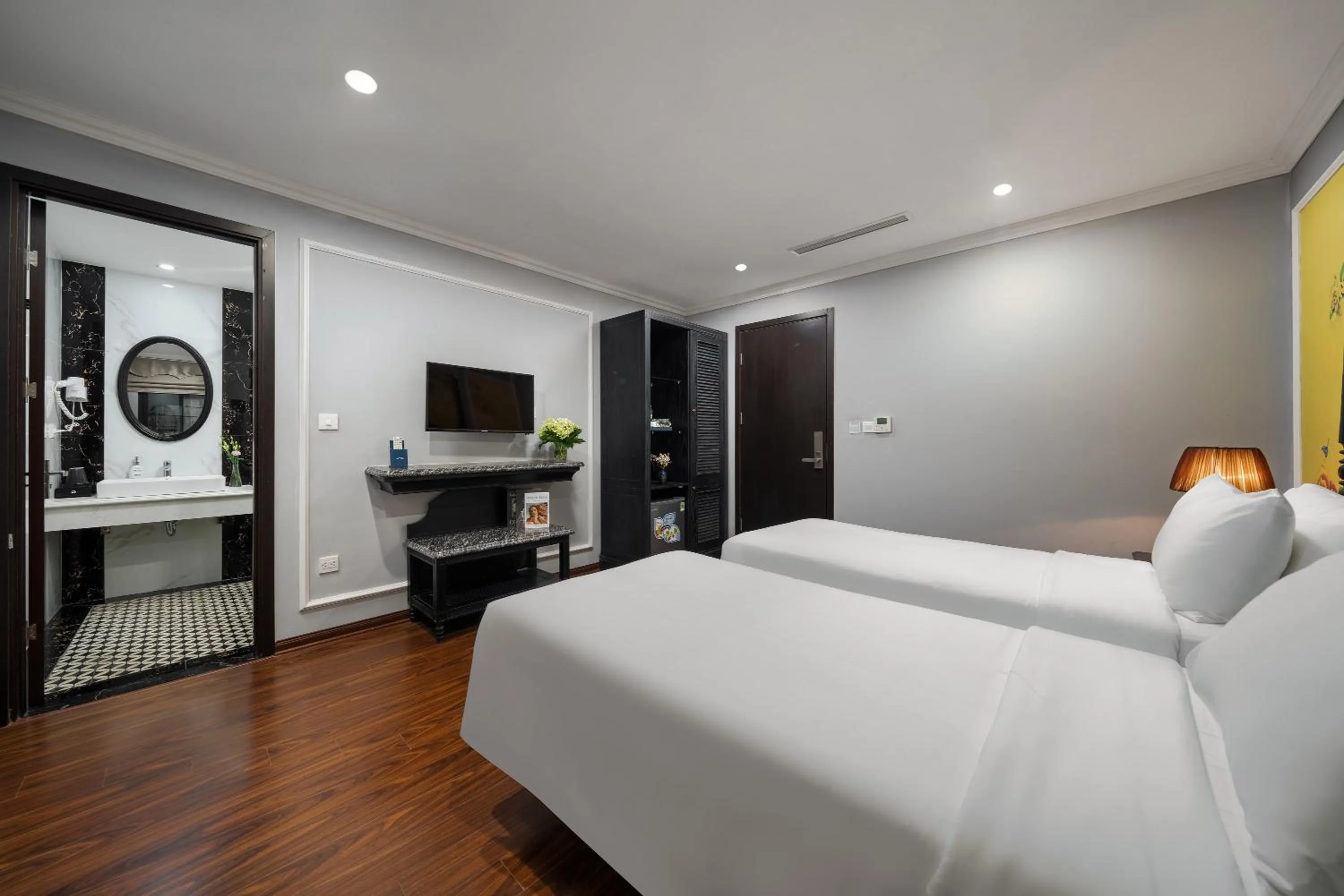 Bed in Amara Hanoi Hotel and Spa