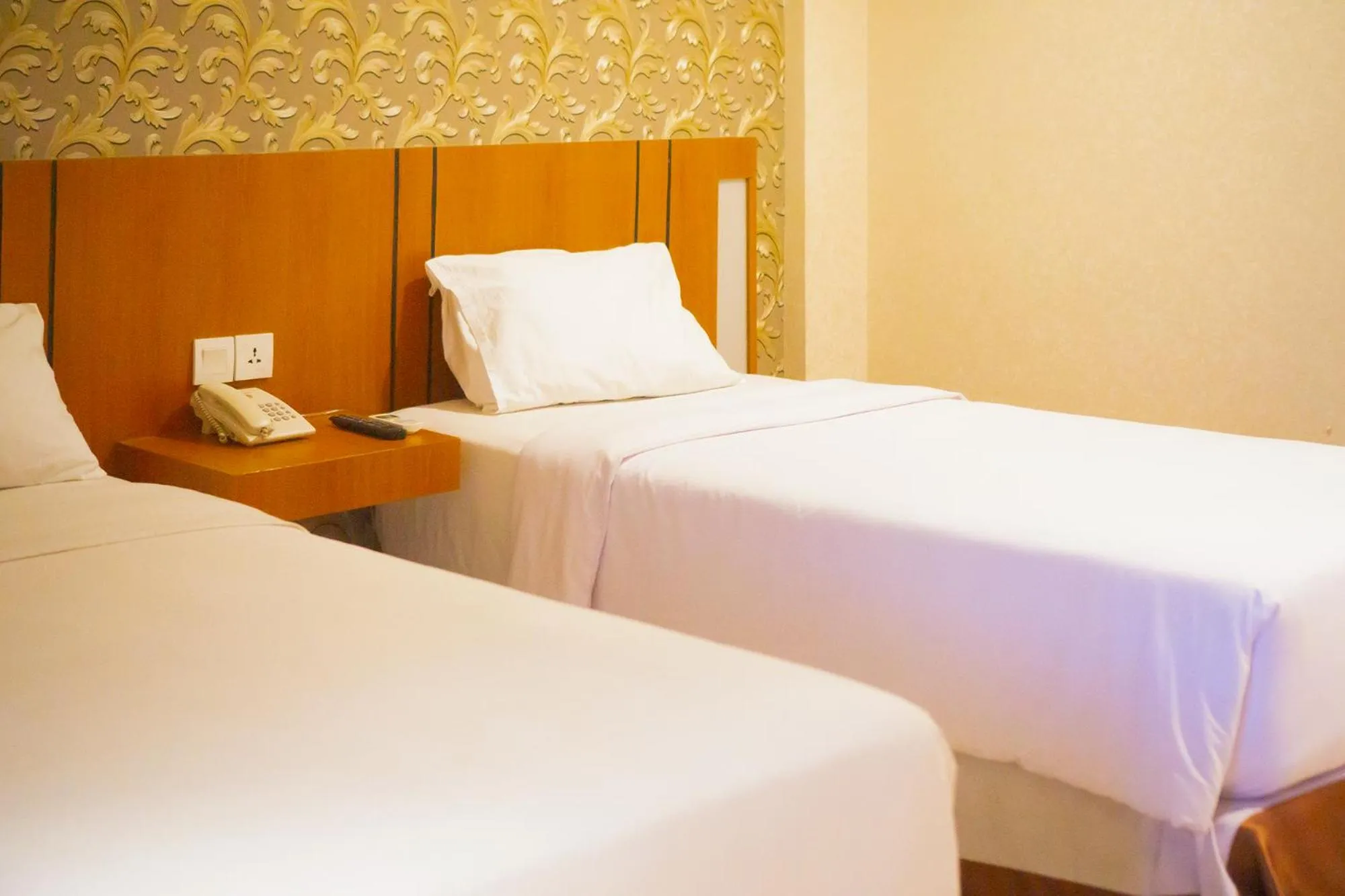 Bed in Portola Arabia Hotel Banda Aceh