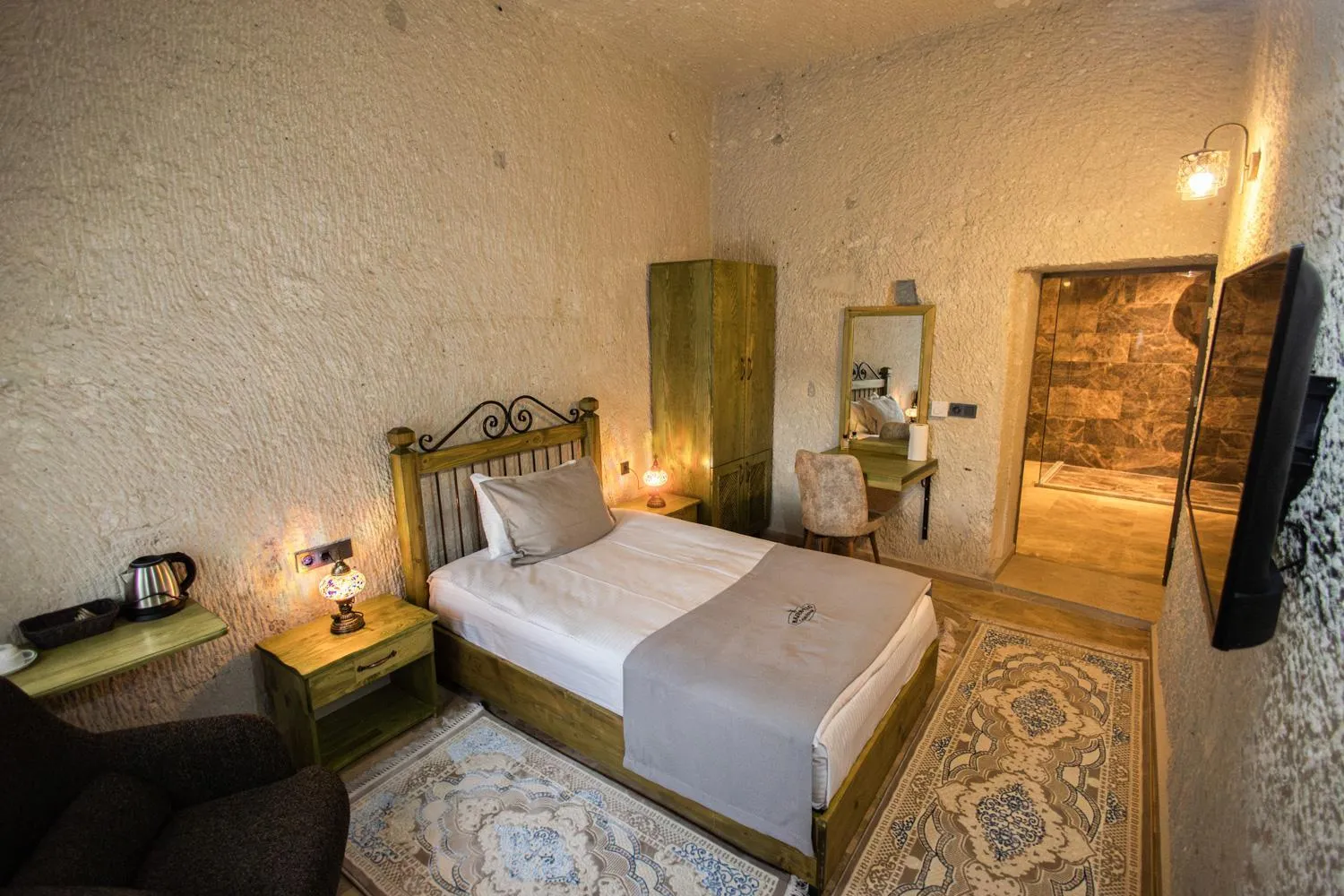 Bed in Majestic Cave House