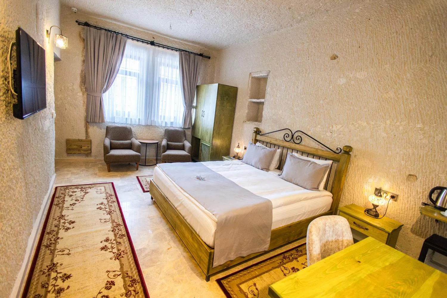 Bed in Majestic Cave House