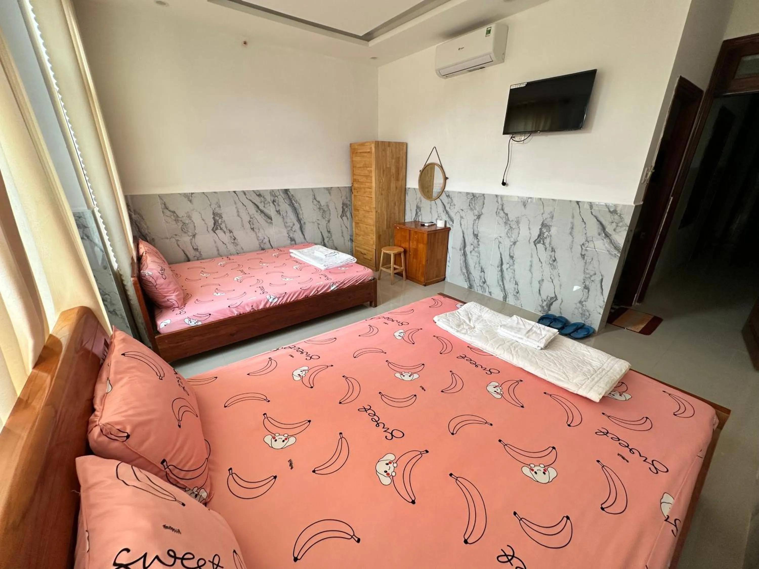 Bed in Anh Thư Motel