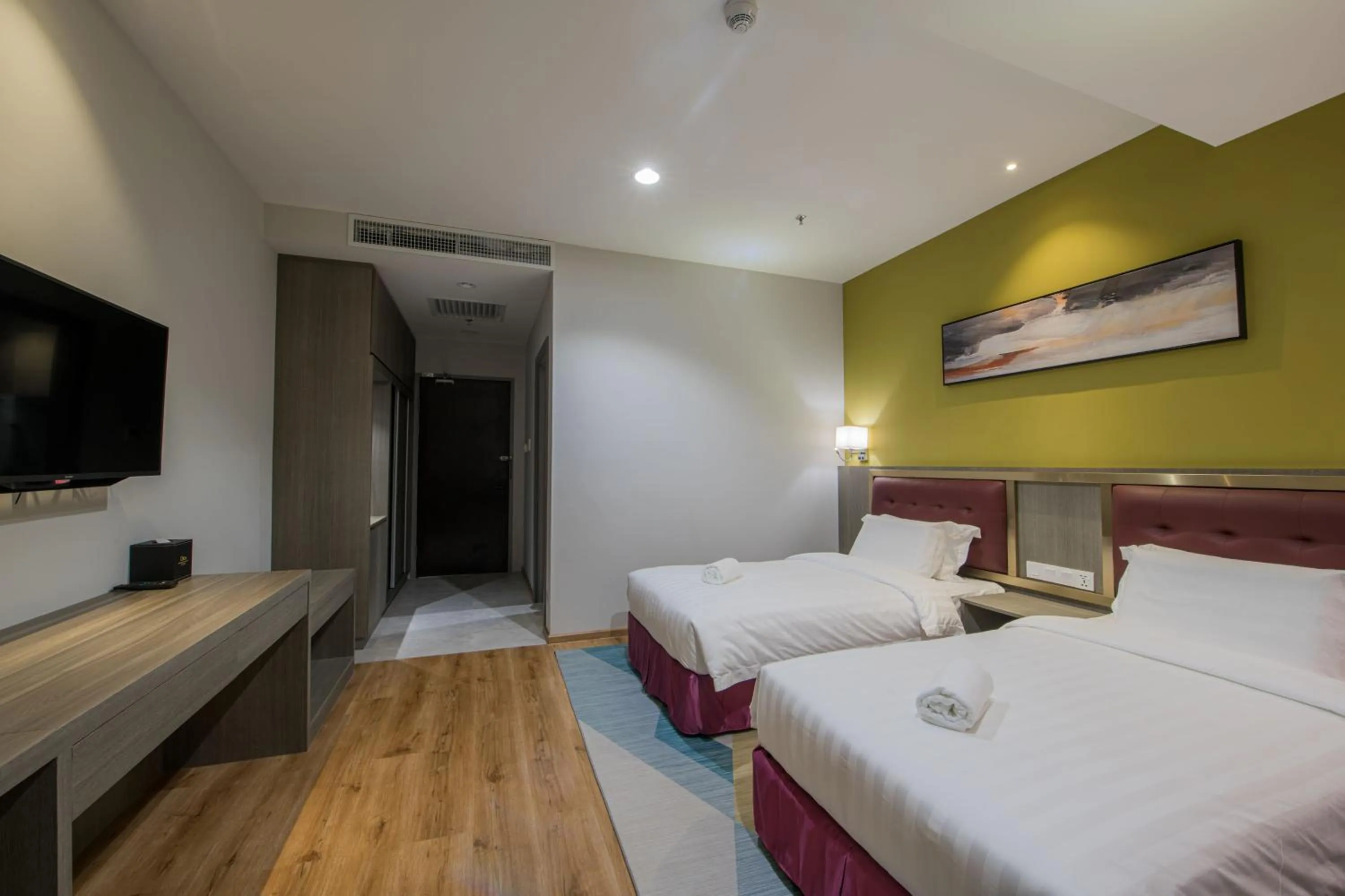 Bed in Grand InHotel Kota Kinabalu