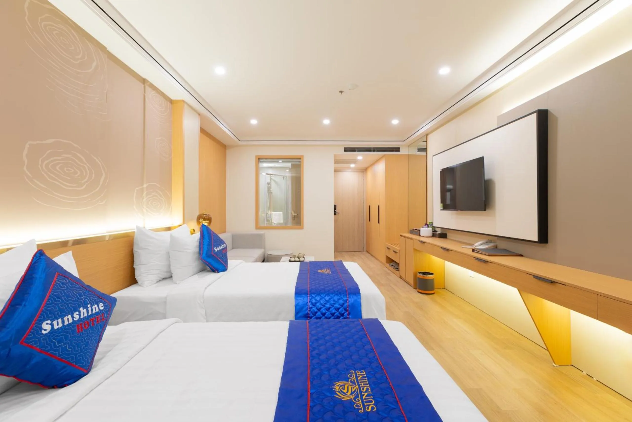 Bed in Sunshine Apartment Hotel