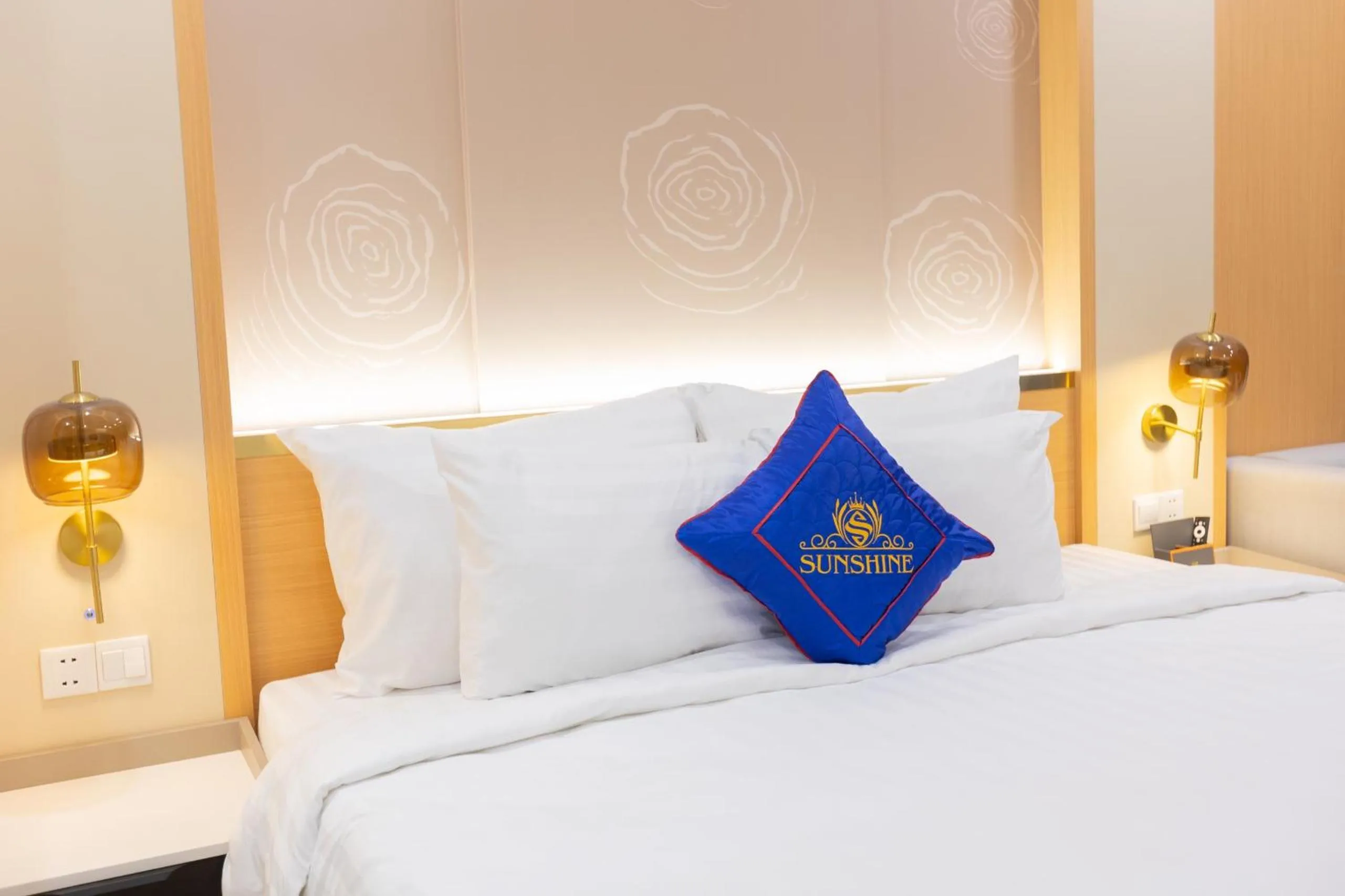 Bed in Sunshine Apartment Hotel