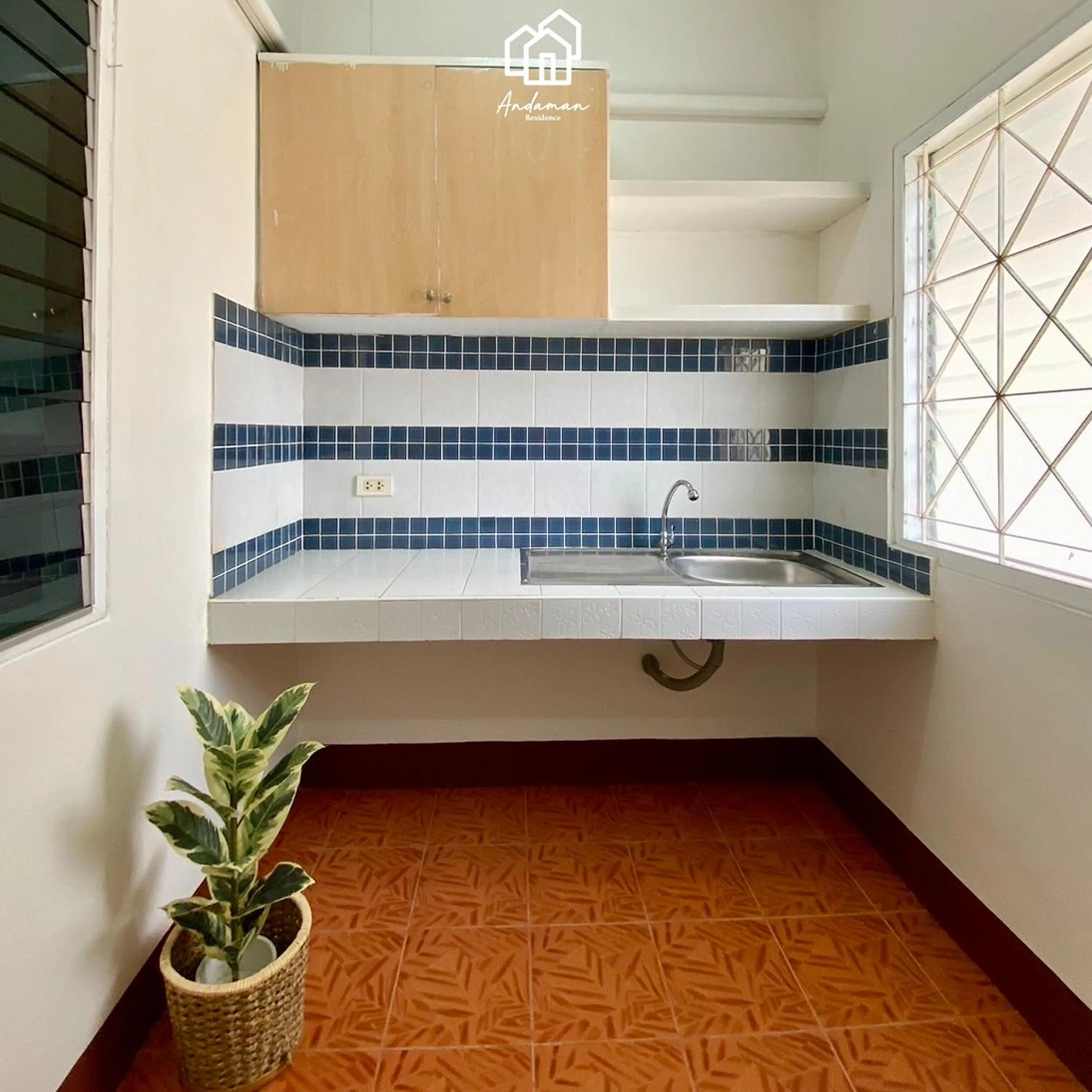 Kitchen or kitchenette in Andaman Residence