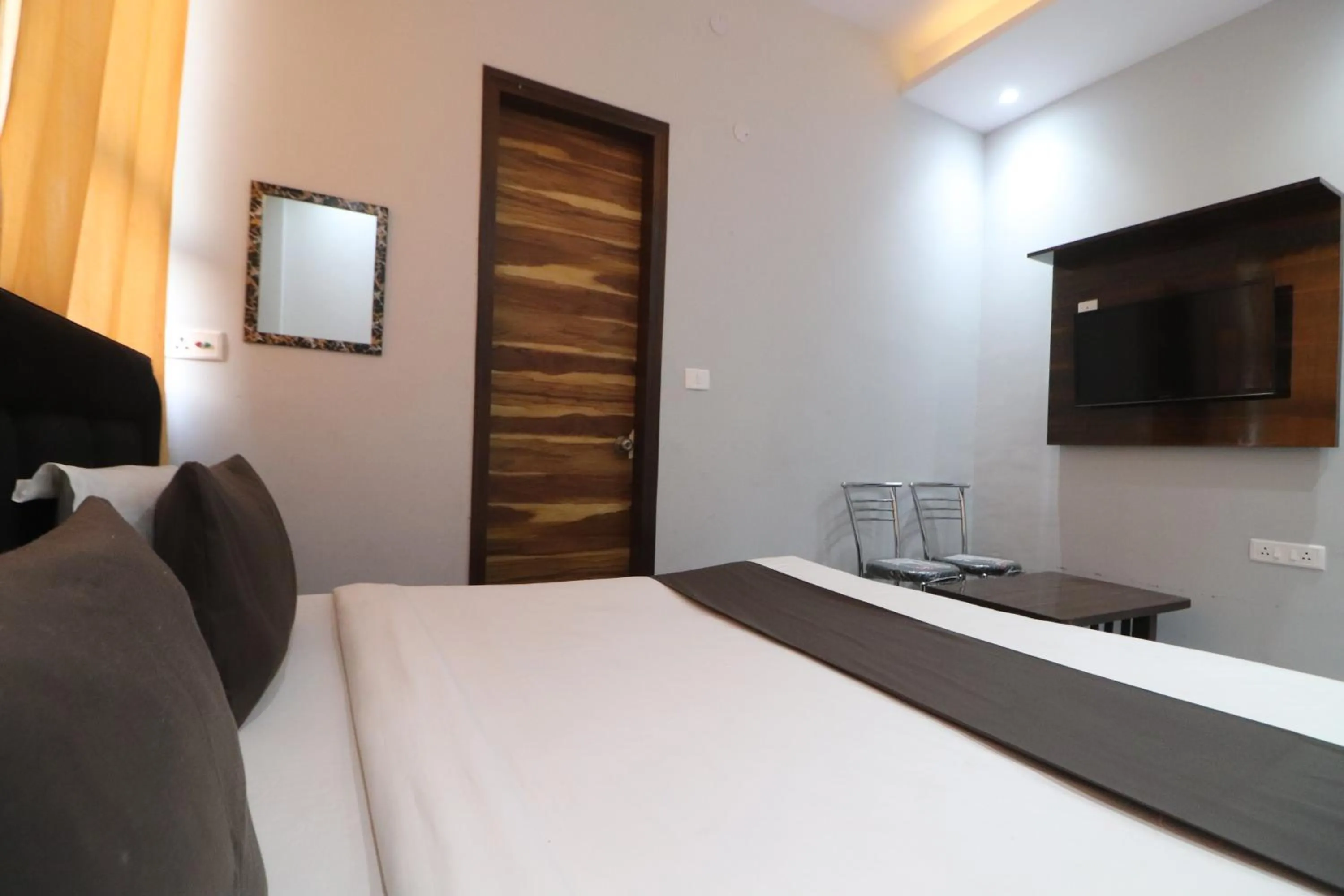 Bedroom, Bed in Twamev couple Friendly Rajouri garden by The Arrow