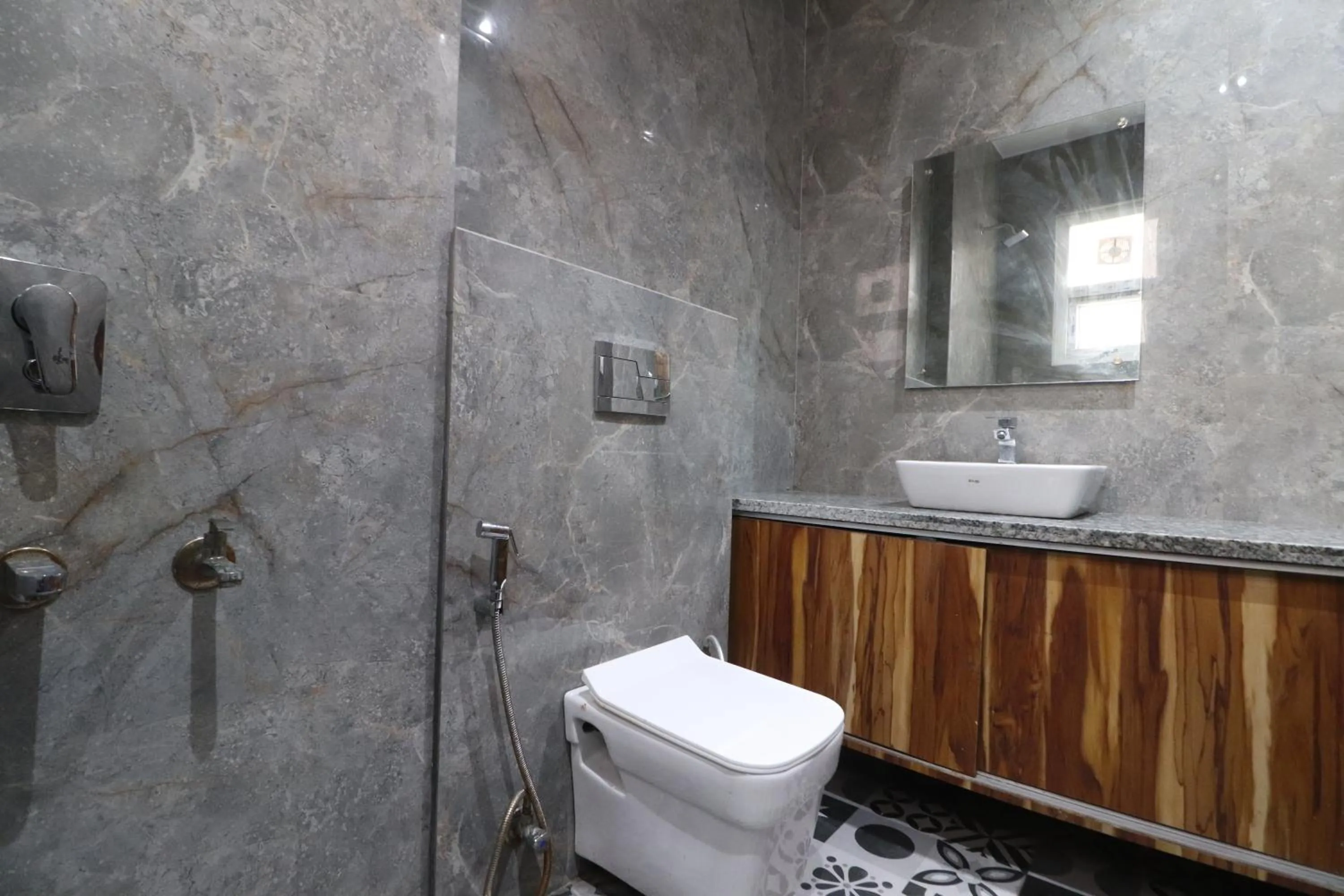 Bathroom in Twamev couple Friendly Rajouri garden by The Arrow