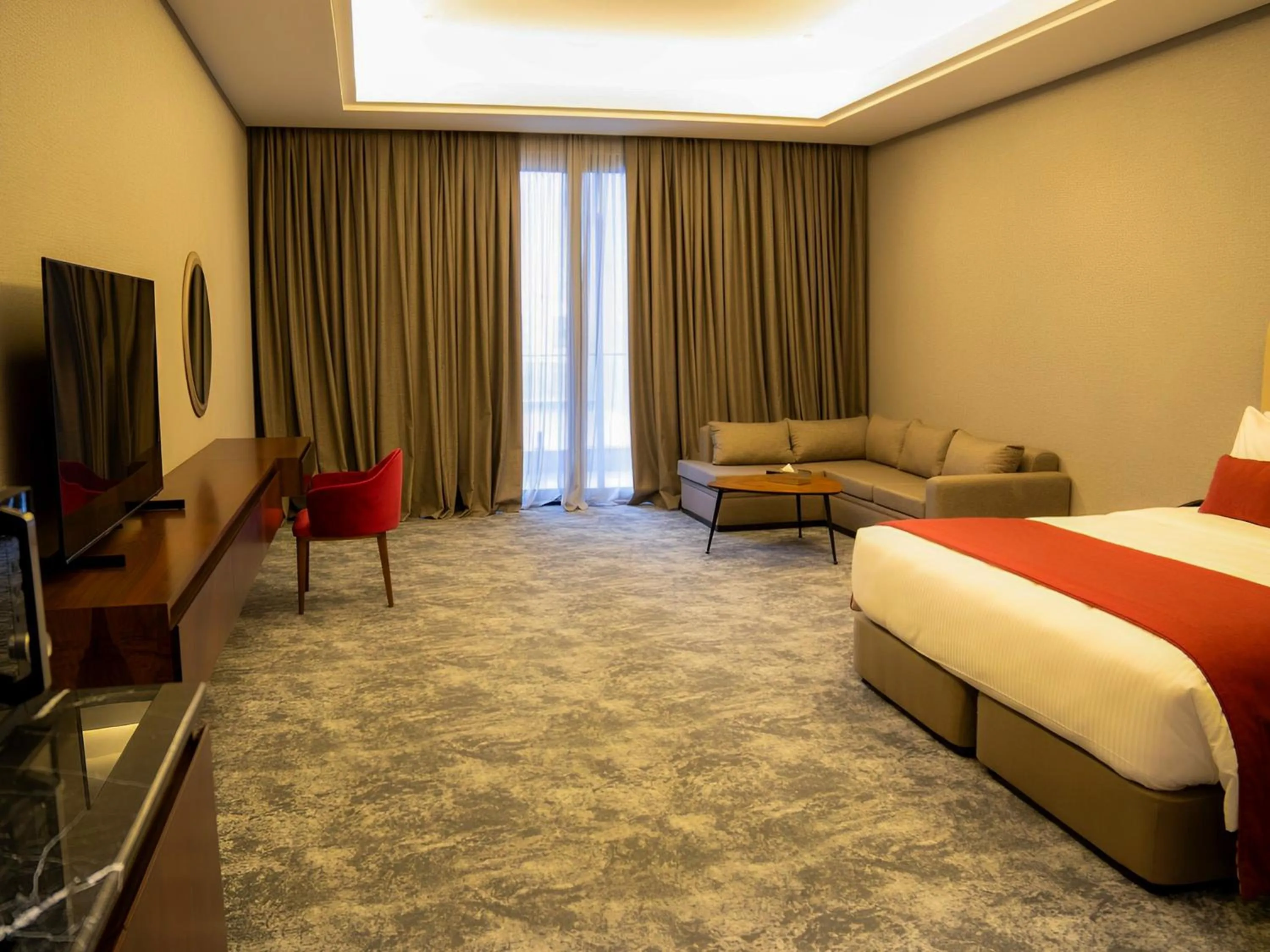 Photo of the whole room, Bed in Ramada Hotel & Suites by Wyndham Erbil 32 Park