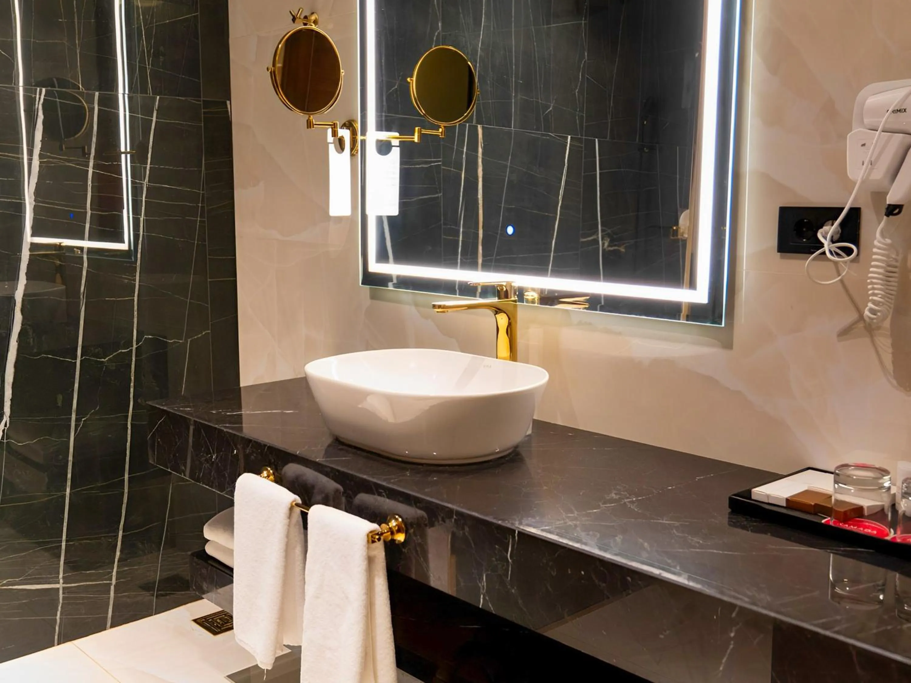 Bathroom in Ramada Hotel & Suites by Wyndham Erbil 32 Park