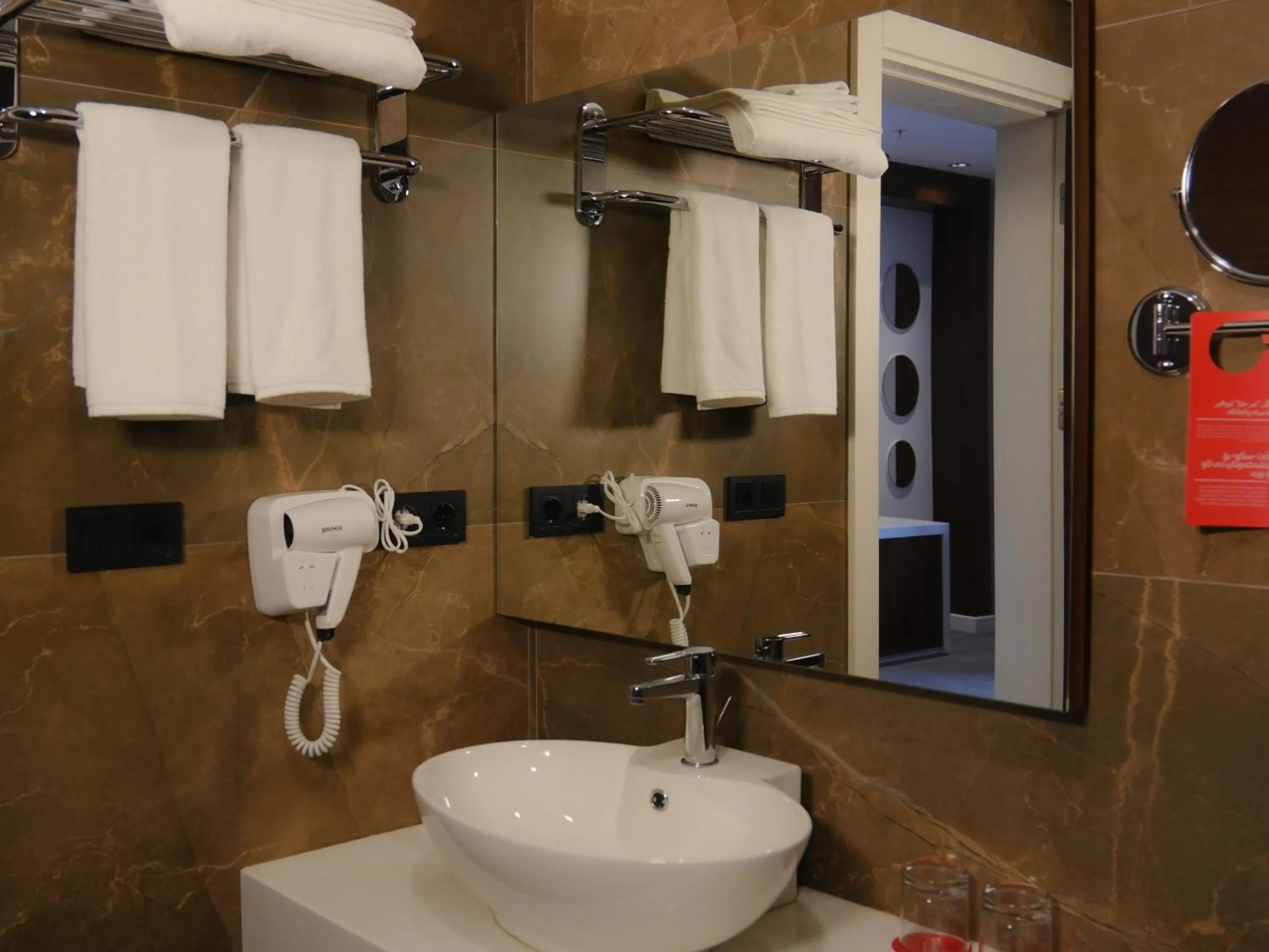 Bathroom in Ramada Hotel & Suites by Wyndham Erbil 32 Park