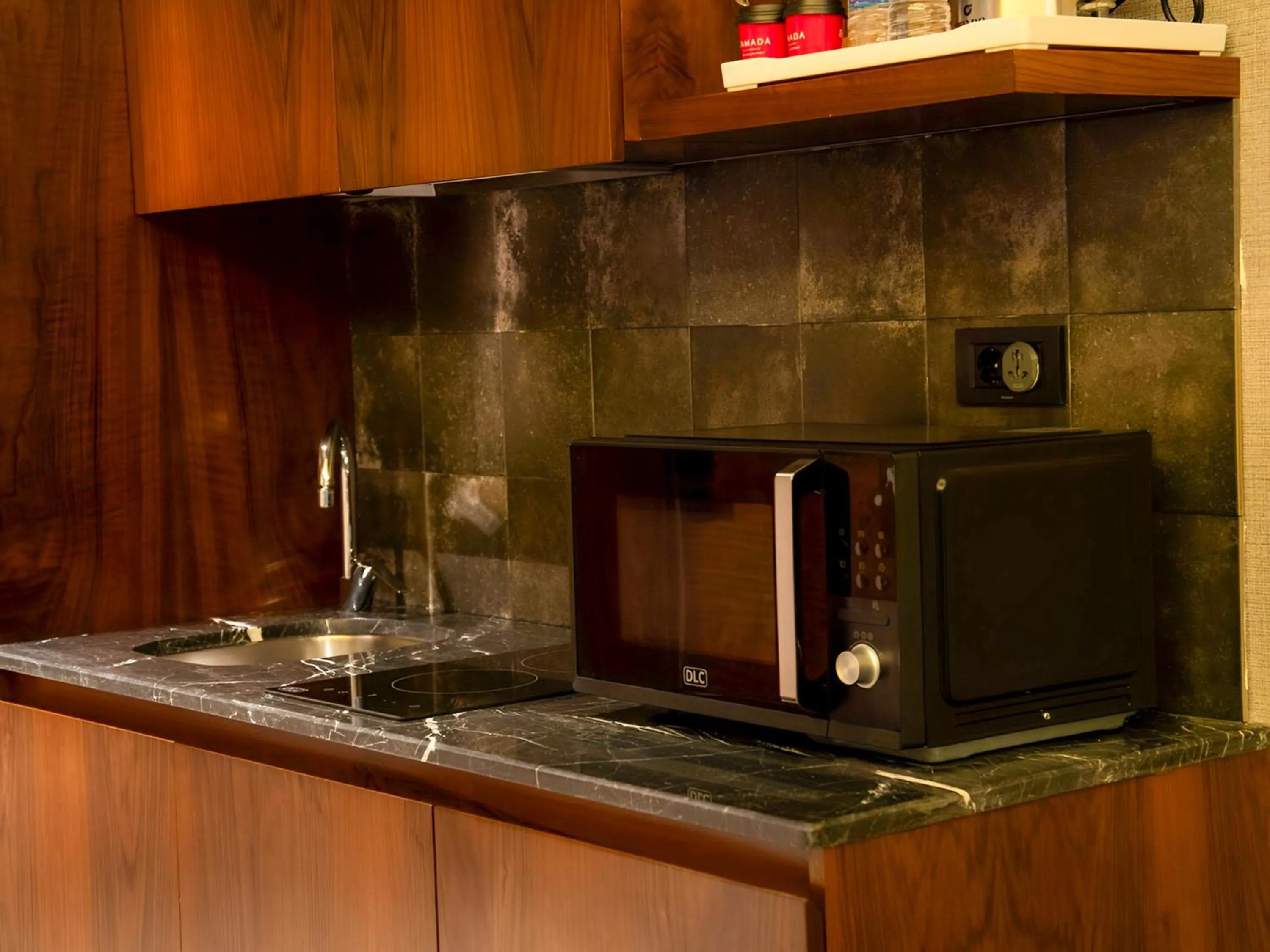 Kitchen or kitchenette in Ramada Hotel & Suites by Wyndham Erbil 32 Park