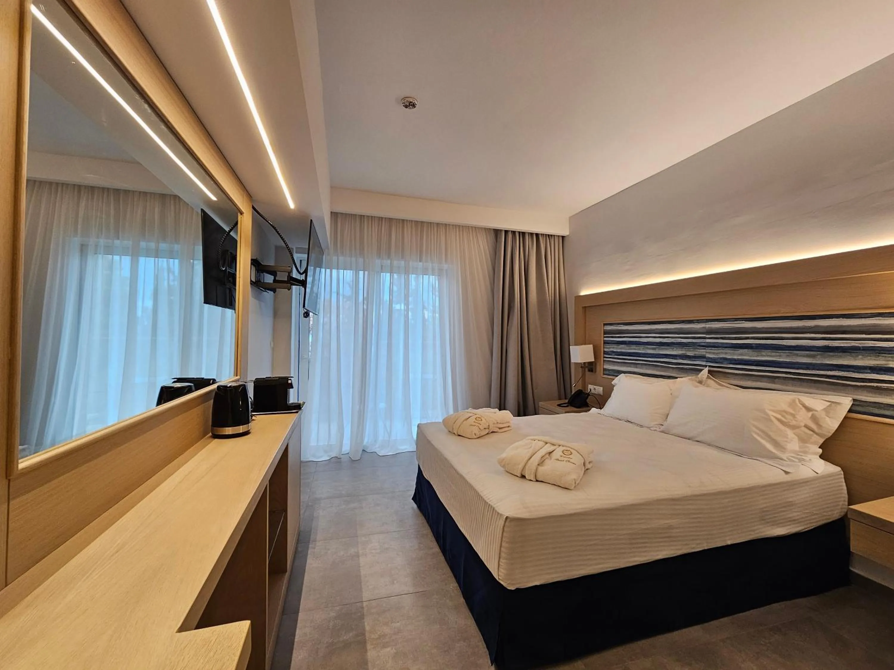 Bed in O Paradise beach Resort and Spa