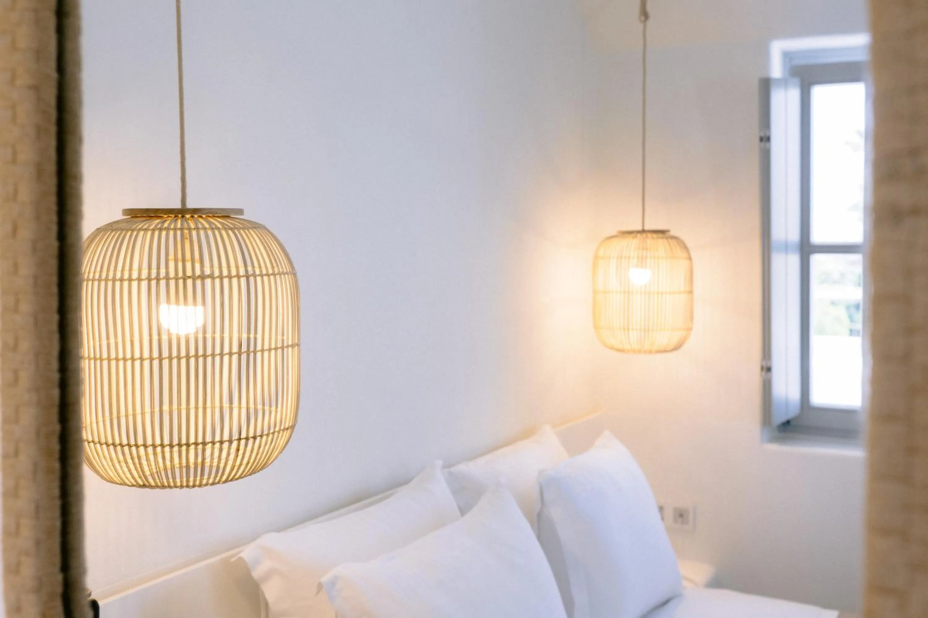 Bed in Mr & Mrs White Paros Suites & More