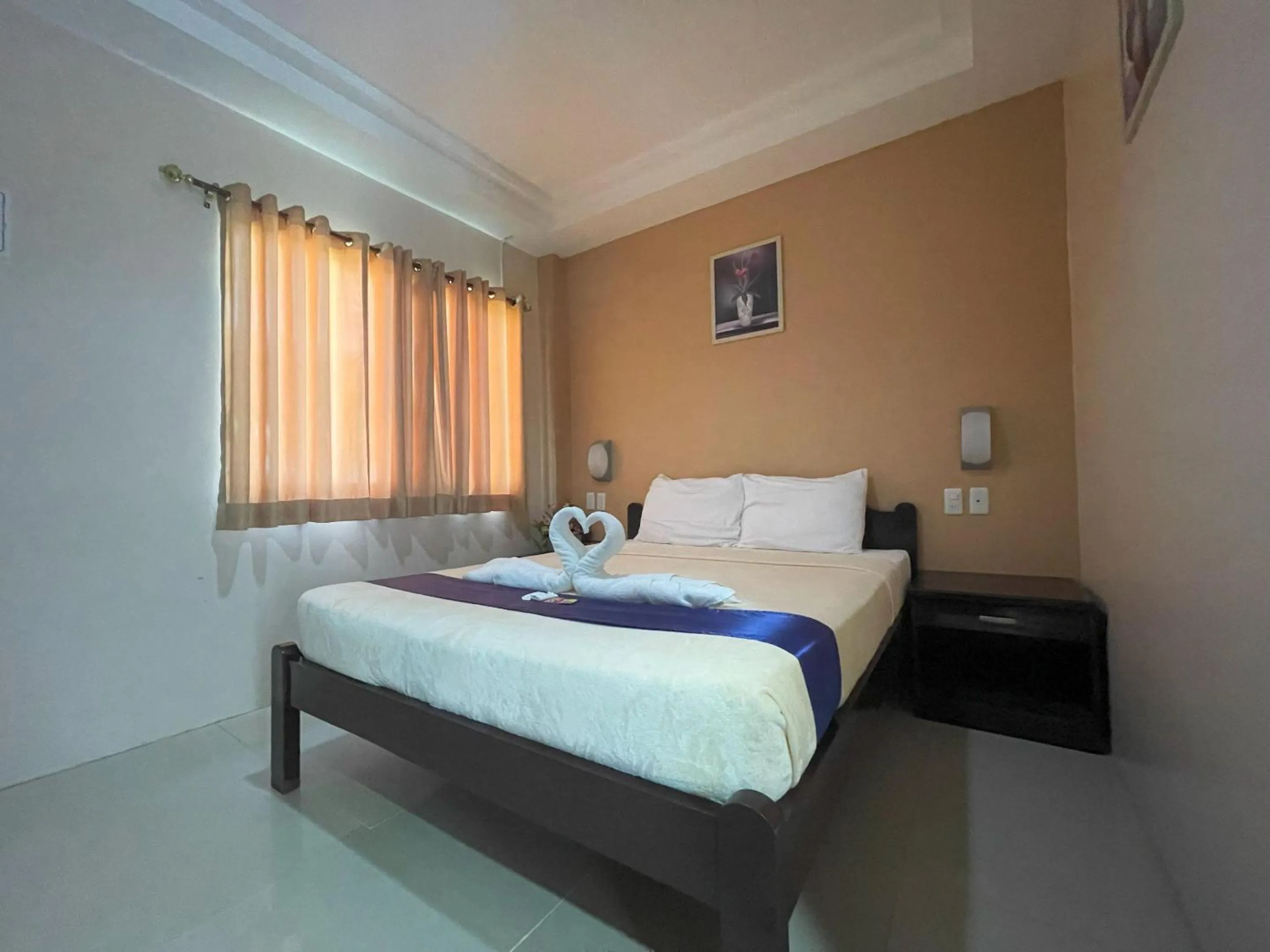 Bedroom, Bed in Argao Seabreeze Hotel powered by Cocotel