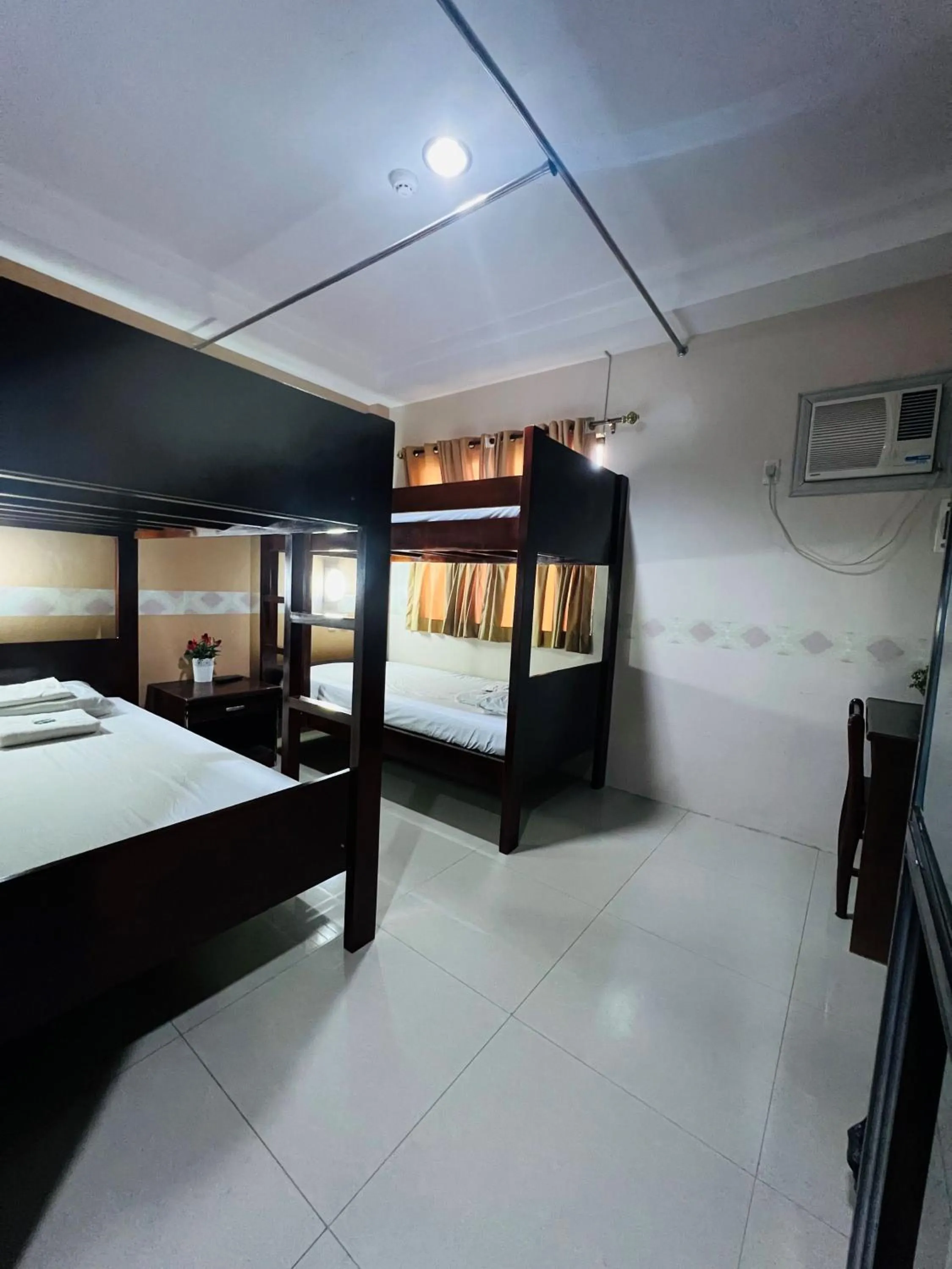 Bedroom, Bed in Argao Seabreeze Hotel powered by Cocotel