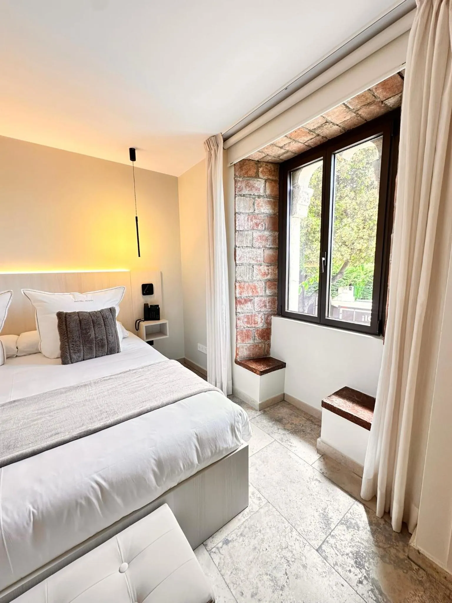 Bed in AlliOli Boutique Hotel Spa