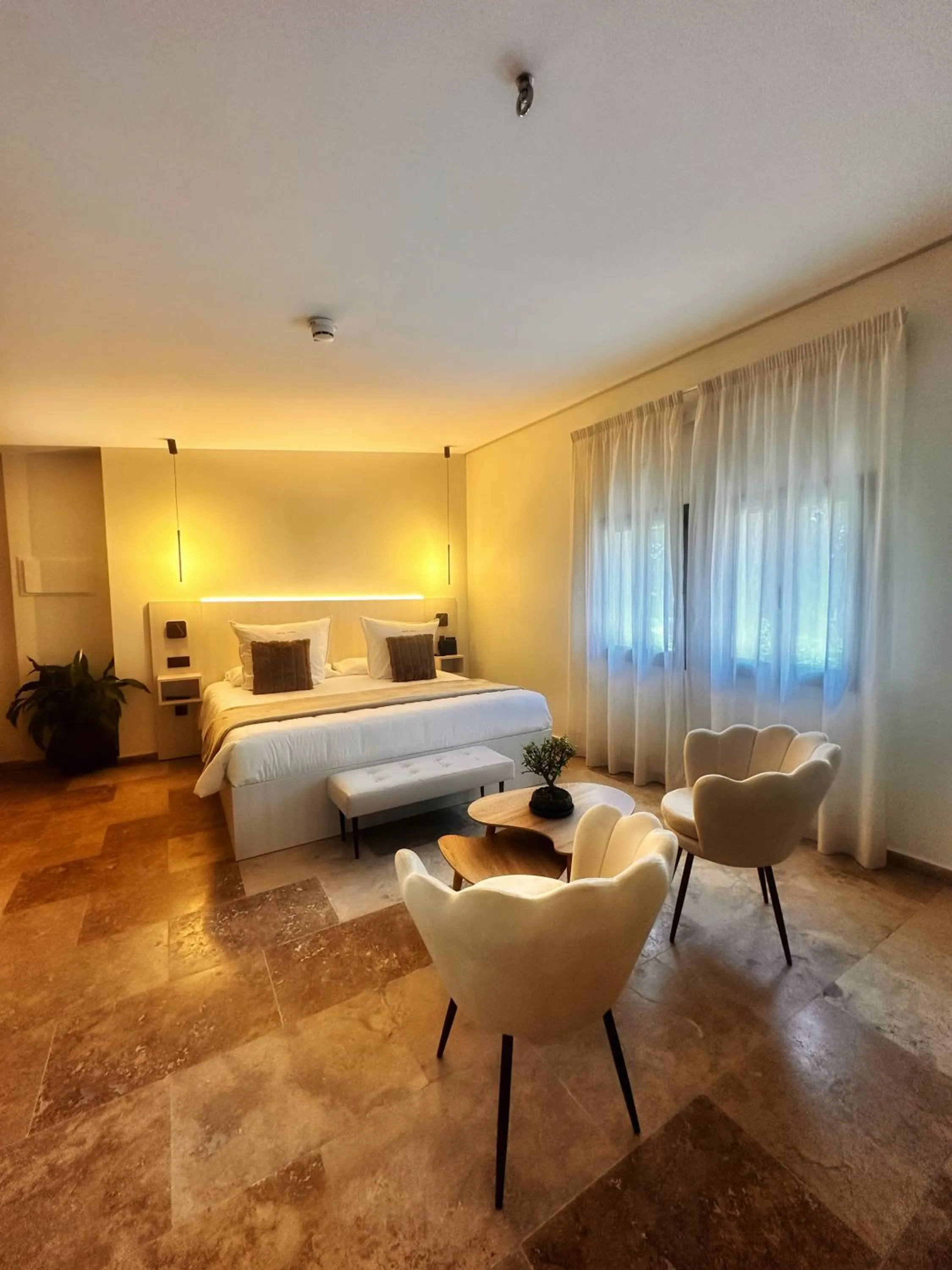 Bed in AlliOli Boutique Hotel Spa