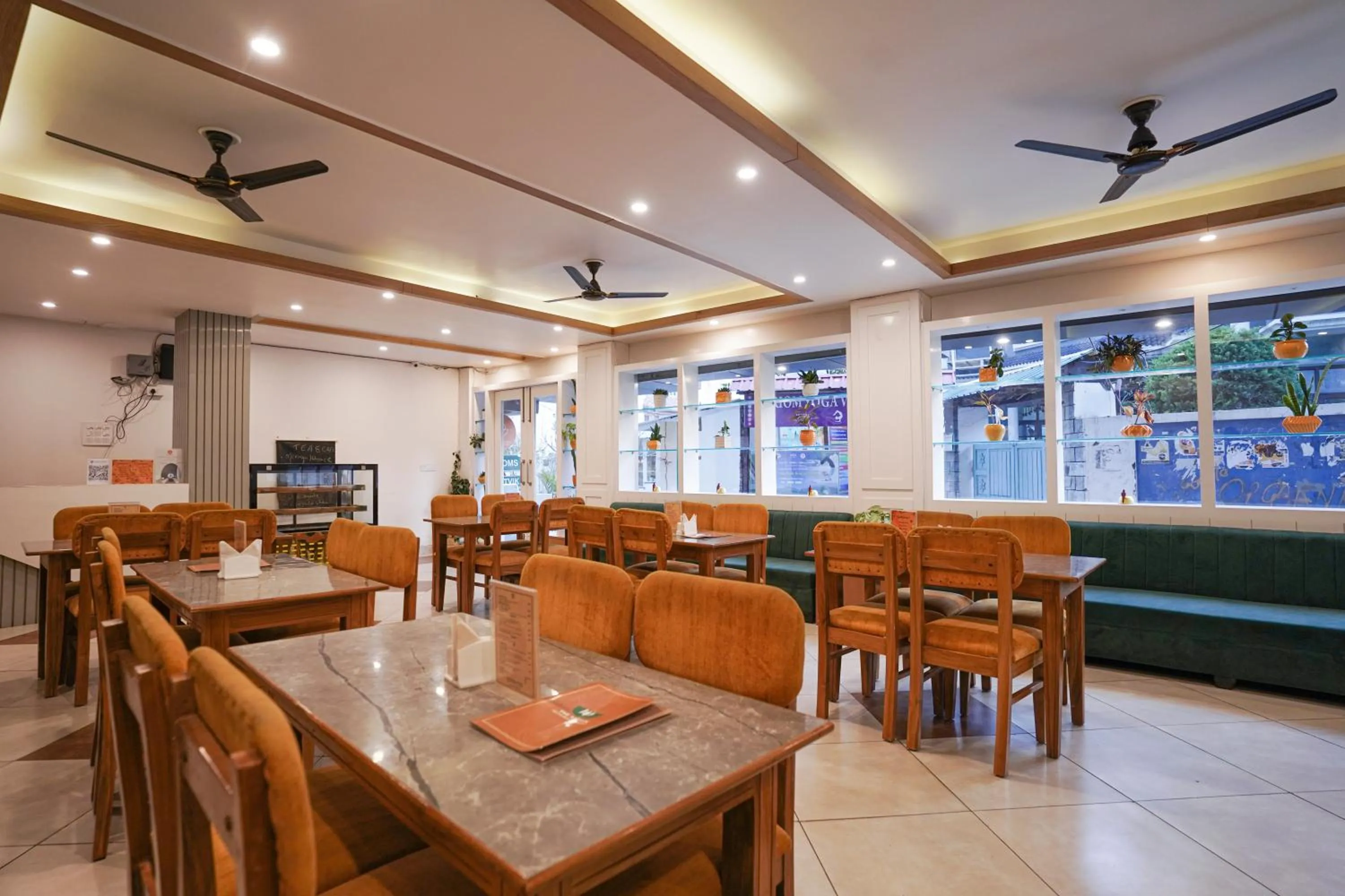 Restaurant/places to eat in Tripli Hotels Ayushman Retreat