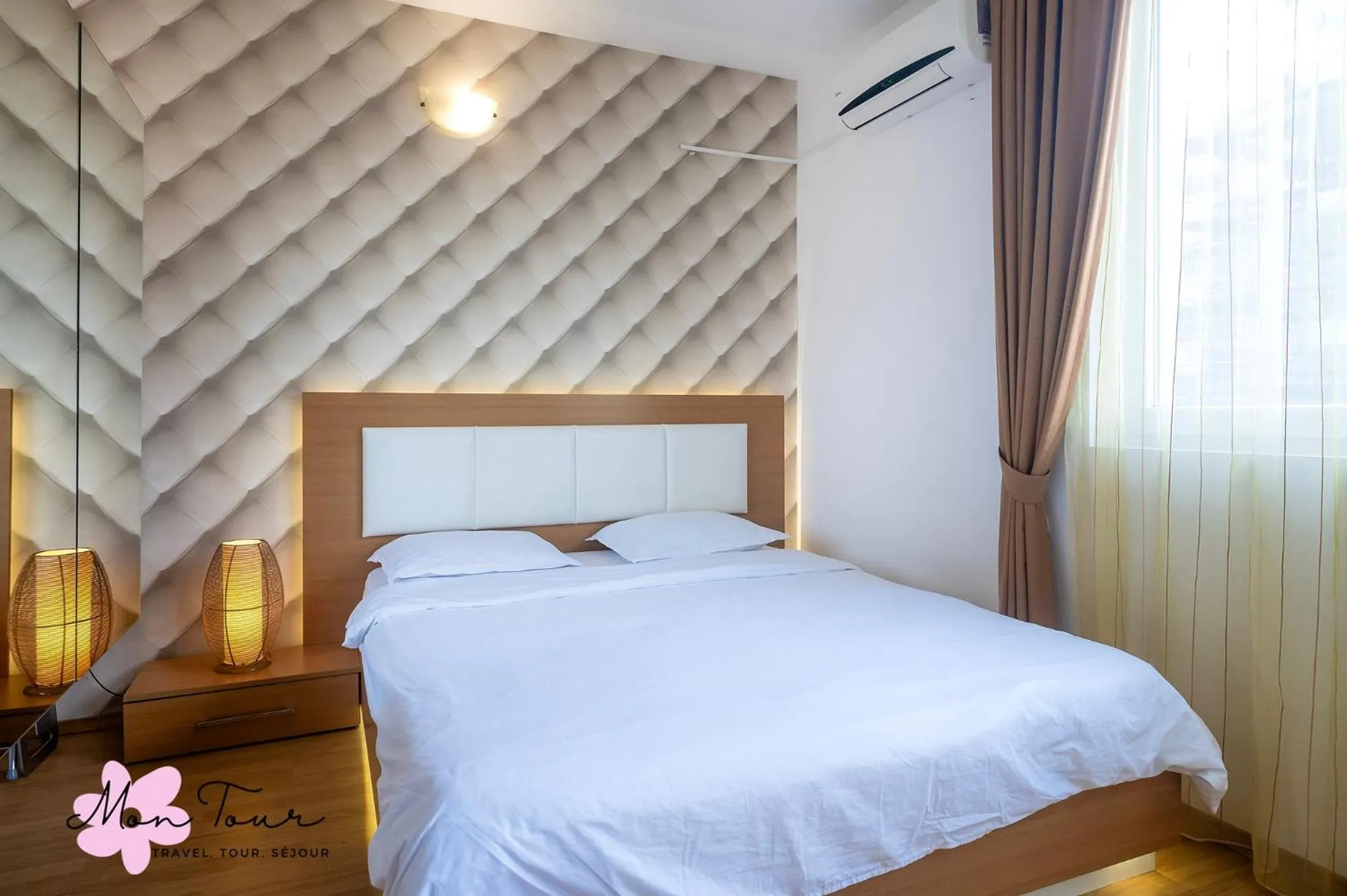 Bed in Mon Tour apartments