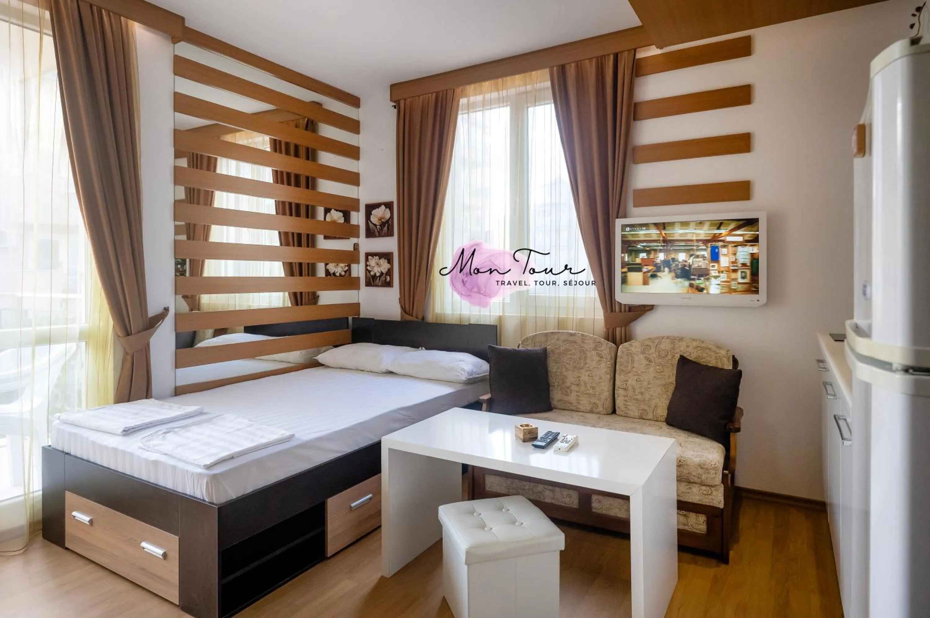 Bed in Mon Tour apartments