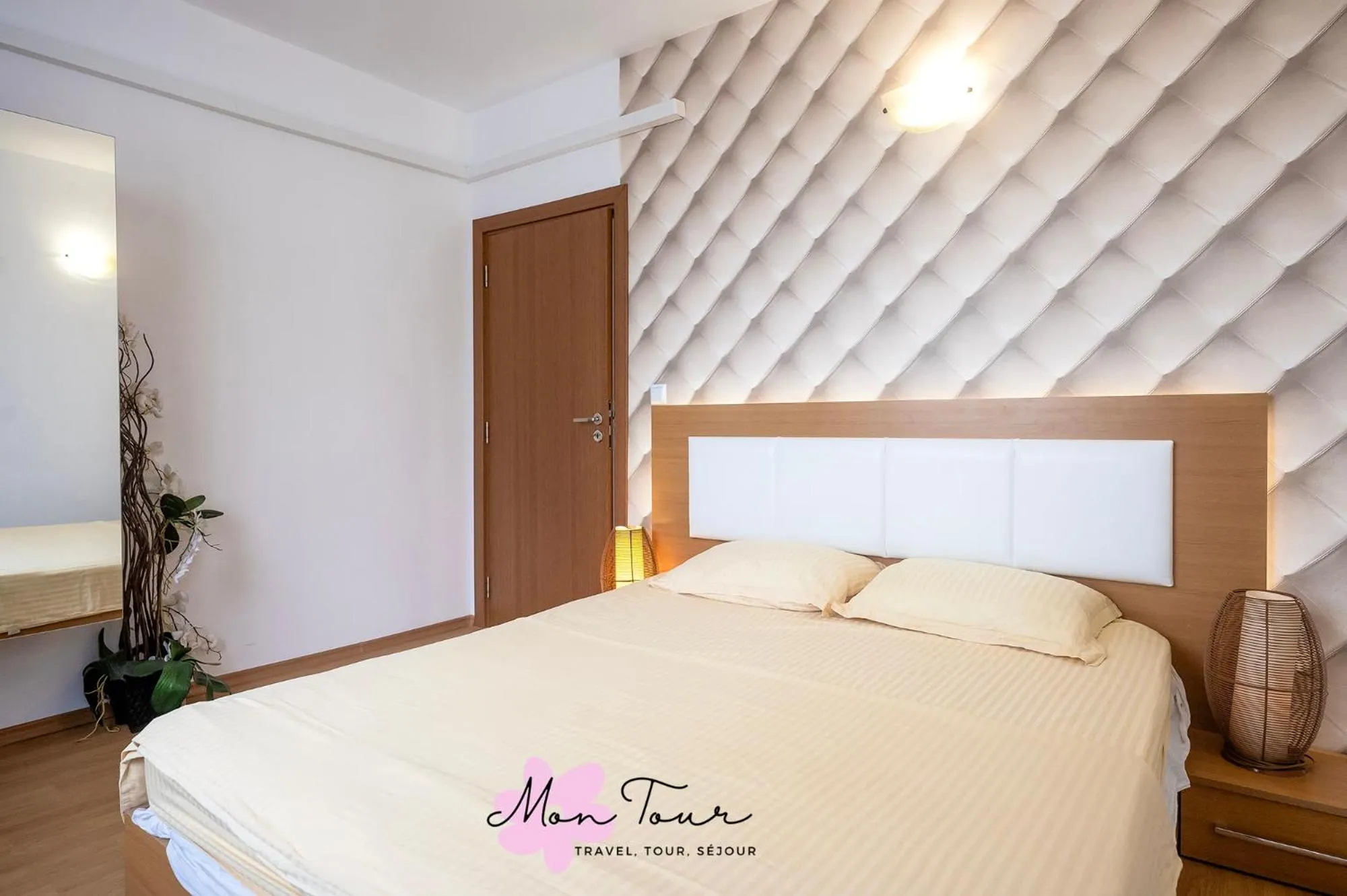 Bed in Mon Tour apartments