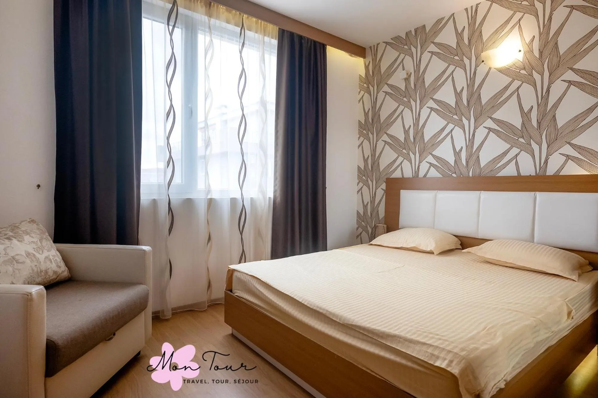 Bed in Mon Tour apartments