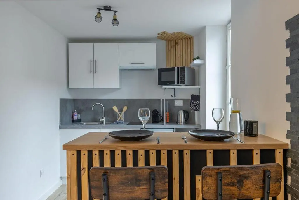 Kitchen or kitchenette in L'Appart des Platanes