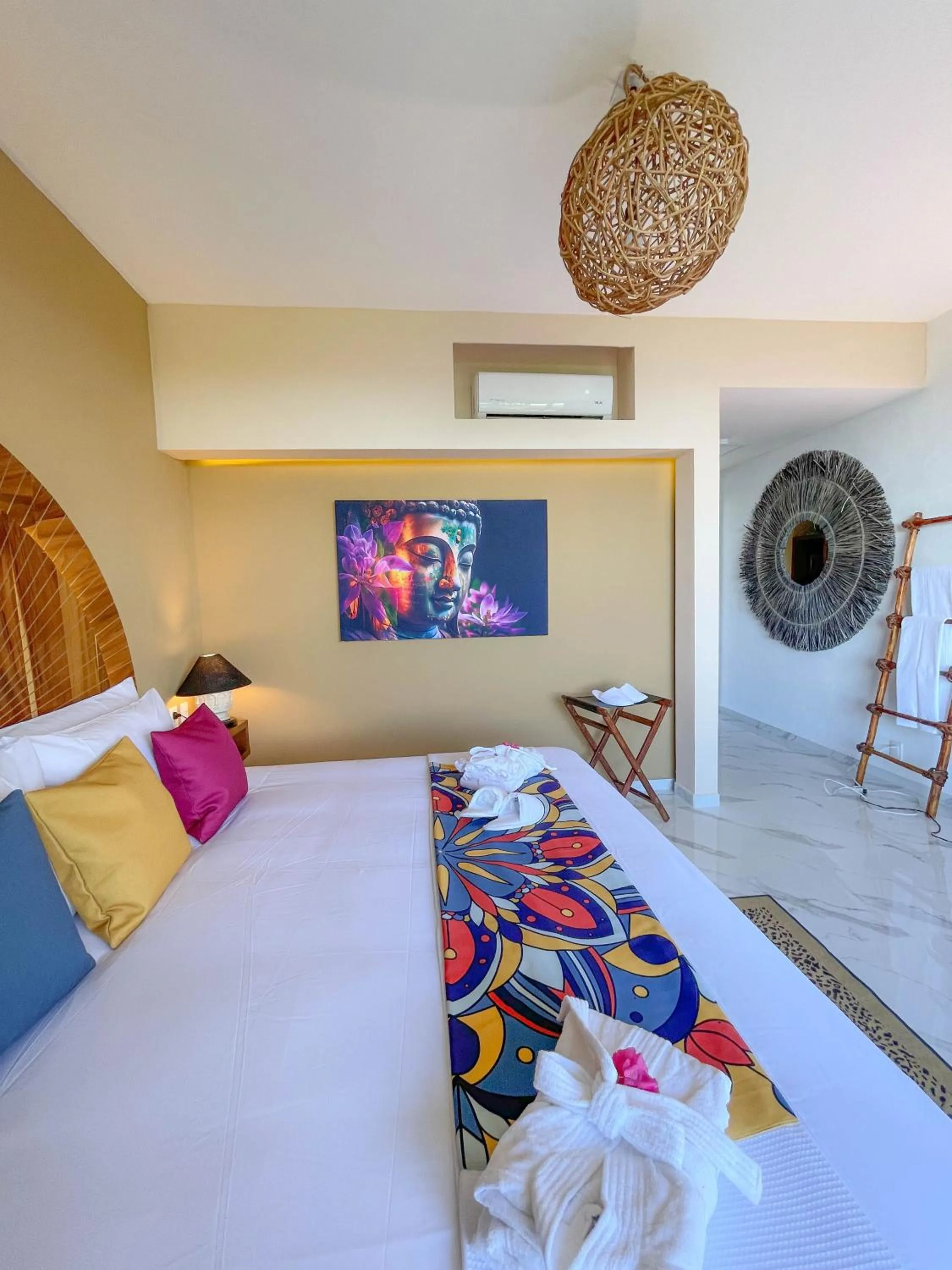 Bed in Akuazul Resorts Adults Only