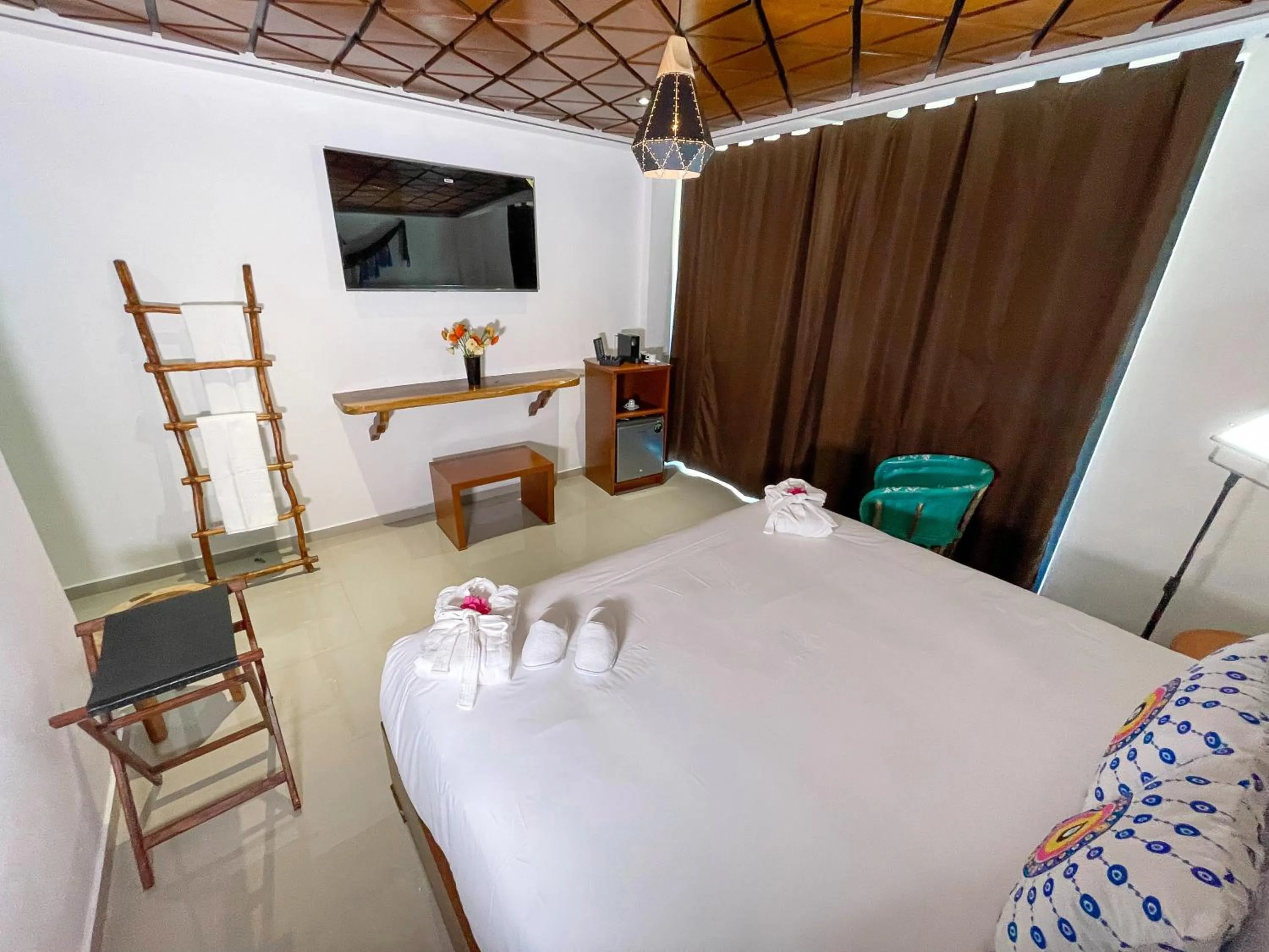 Bed in Akuazul Resorts Adults Only