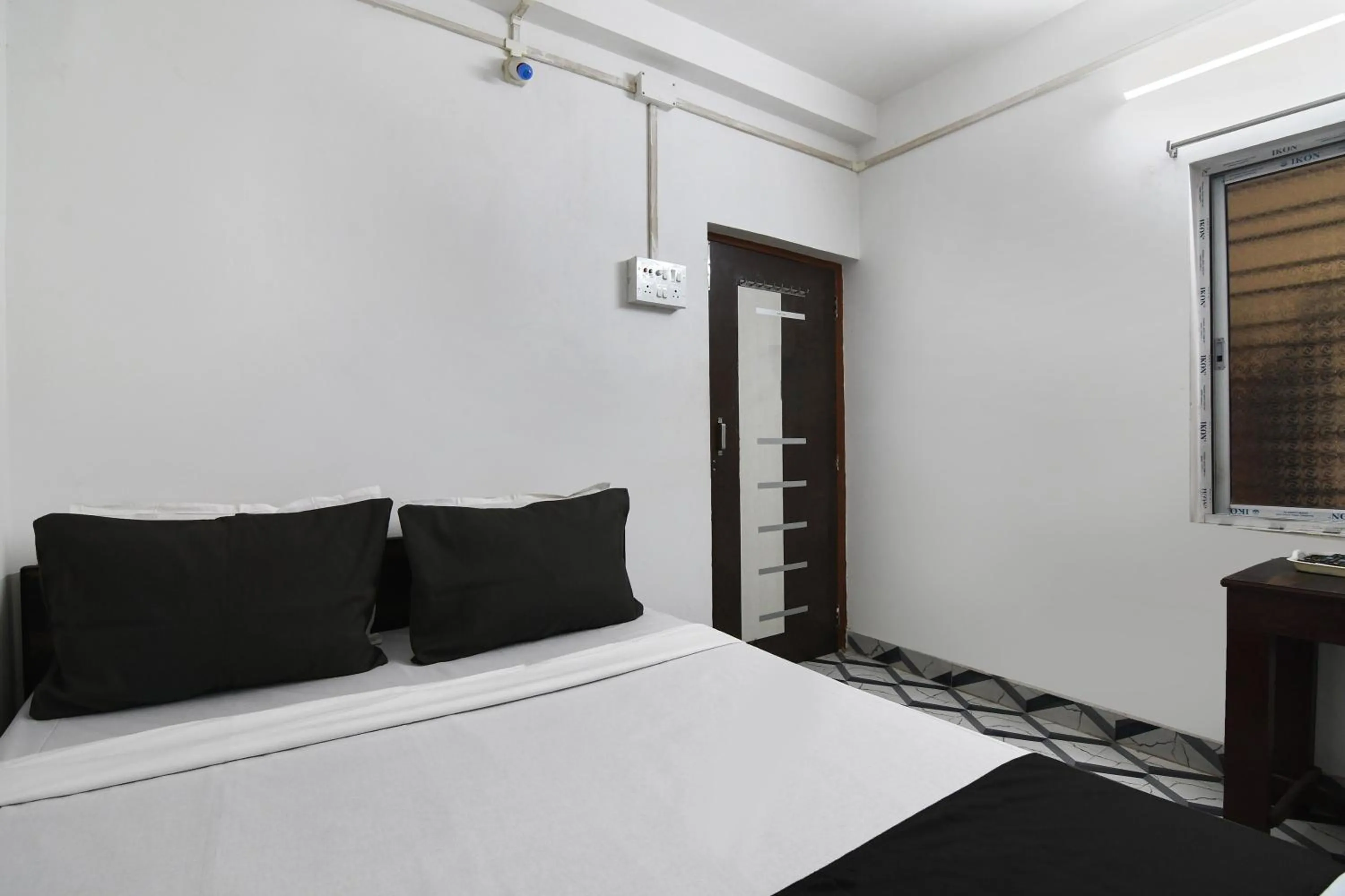 Bathroom, Bed in Hotel O PPS NEST Guest House